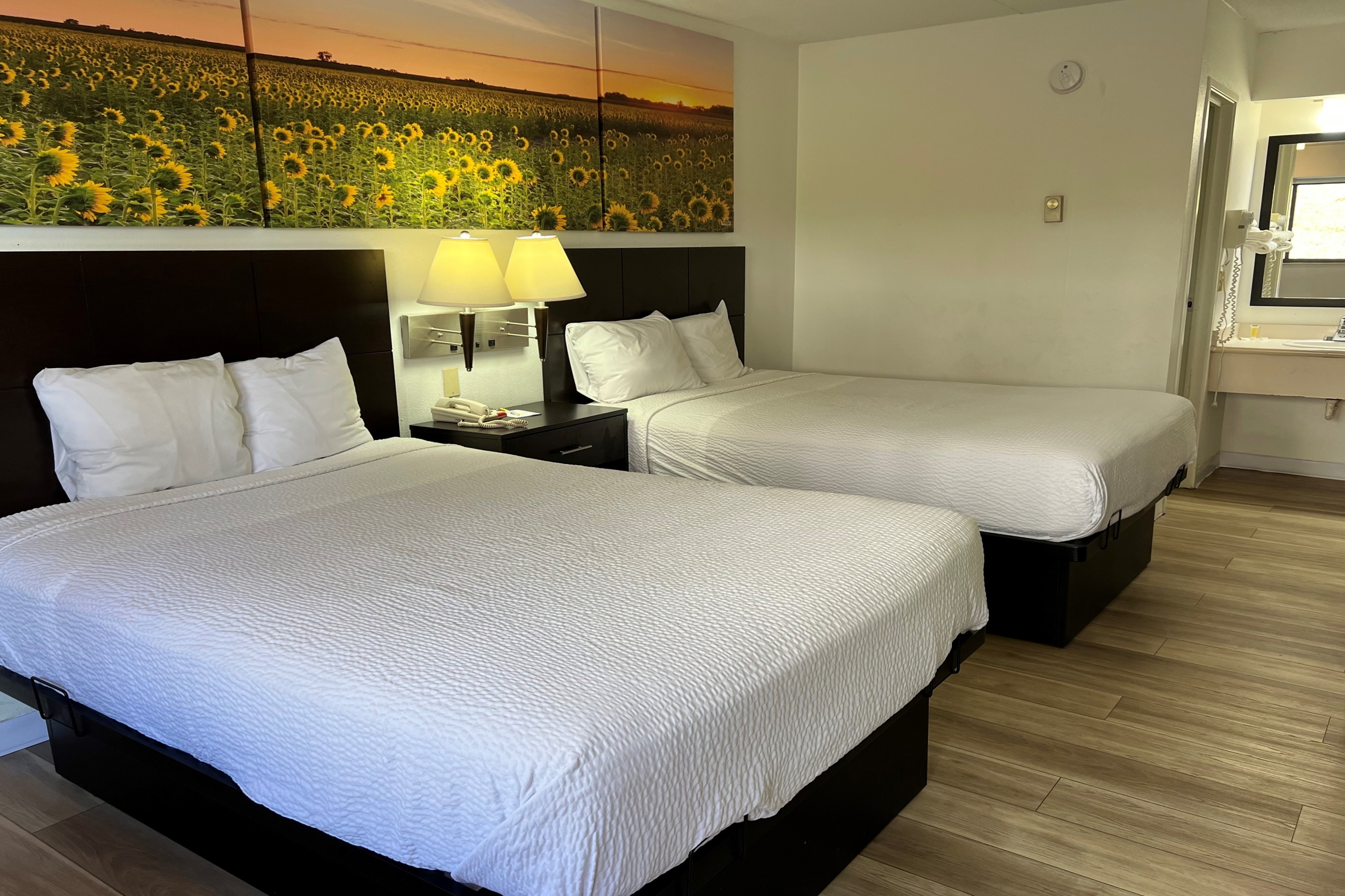 Guest room at the Days Inn by Wyndham Overland Park/Metcalf/Convention Center in Overland Park, Kansas