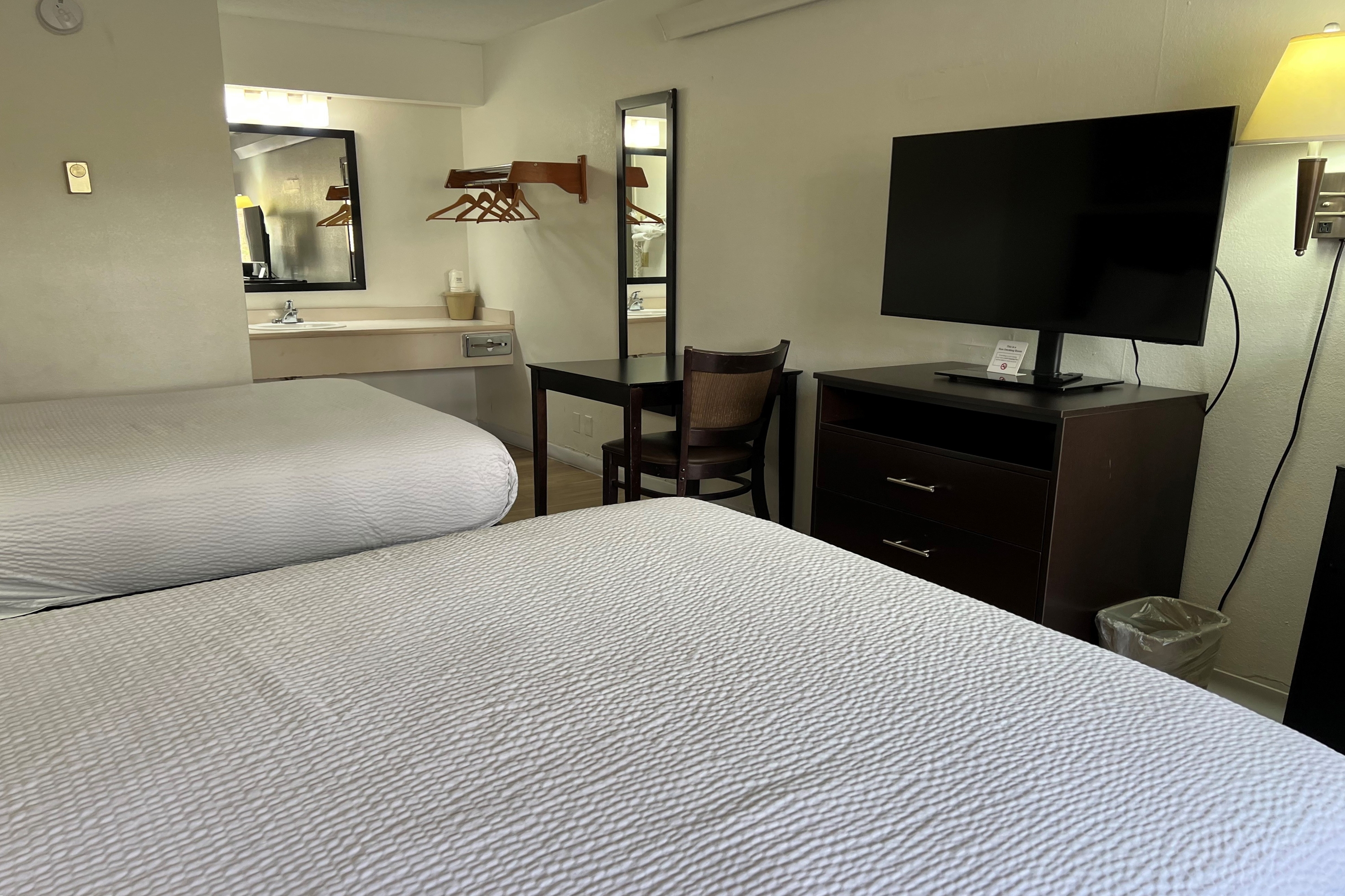 Guest room at the Days Inn by Wyndham Overland Park/Metcalf/Convention Center in Overland Park, Kansas