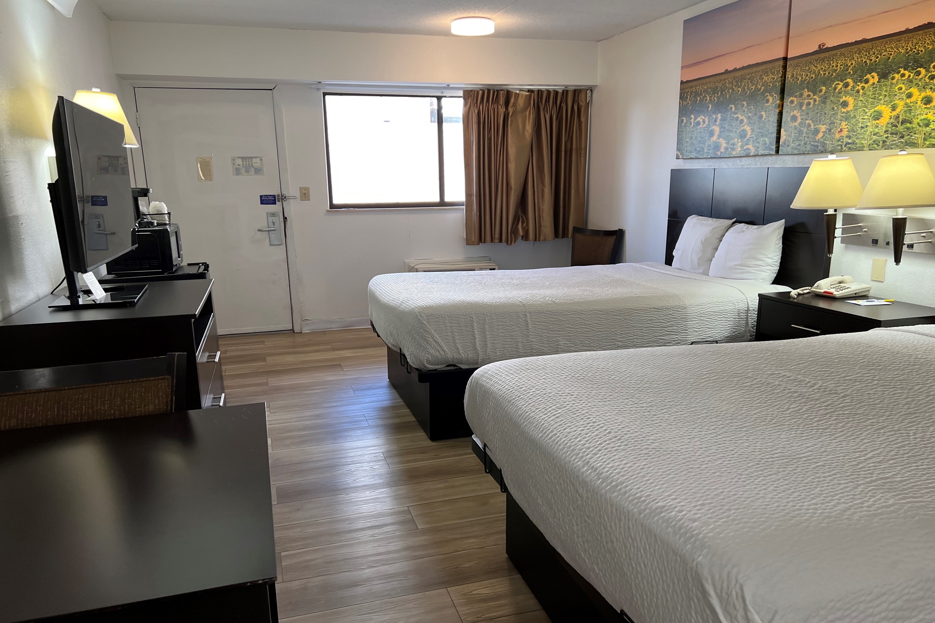 Guest room at the Days Inn by Wyndham Overland Park/Metcalf/Convention Center in Overland Park, Kansas