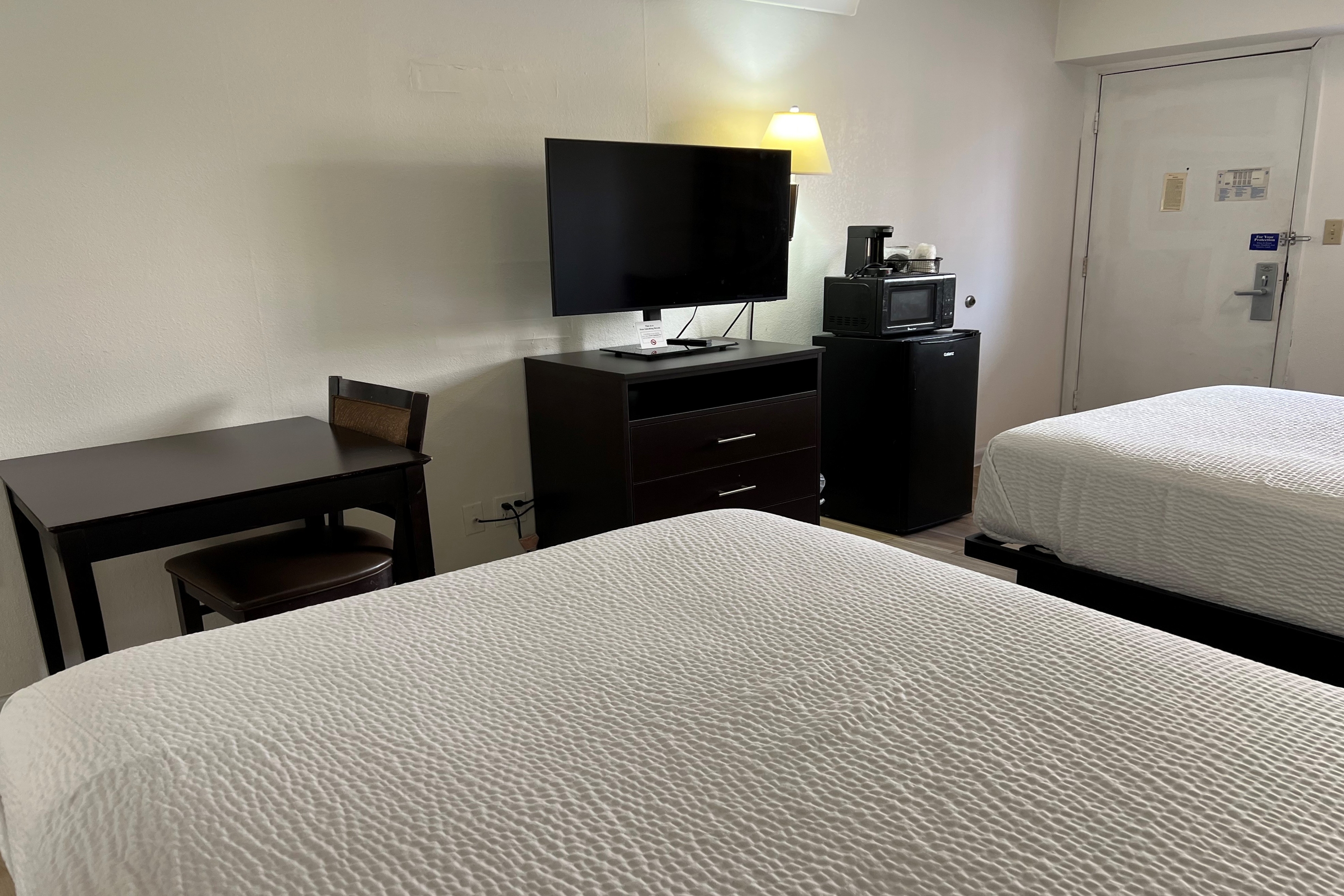 Guest room at the Days Inn by Wyndham Overland Park/Metcalf/Convention Center in Overland Park, Kansas