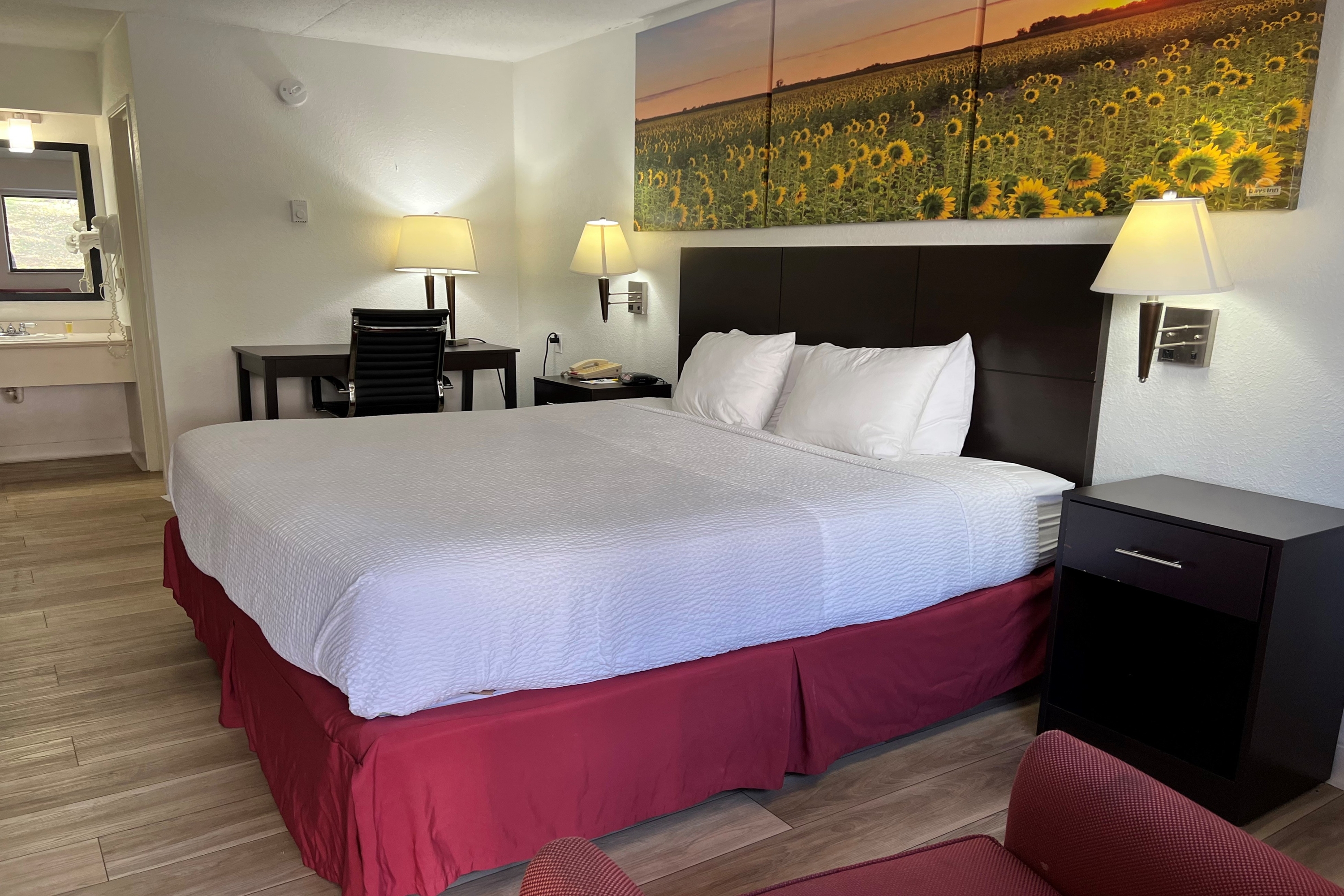 Guest room at the Days Inn by Wyndham Overland Park/Metcalf/Convention Center in Overland Park, Kansas