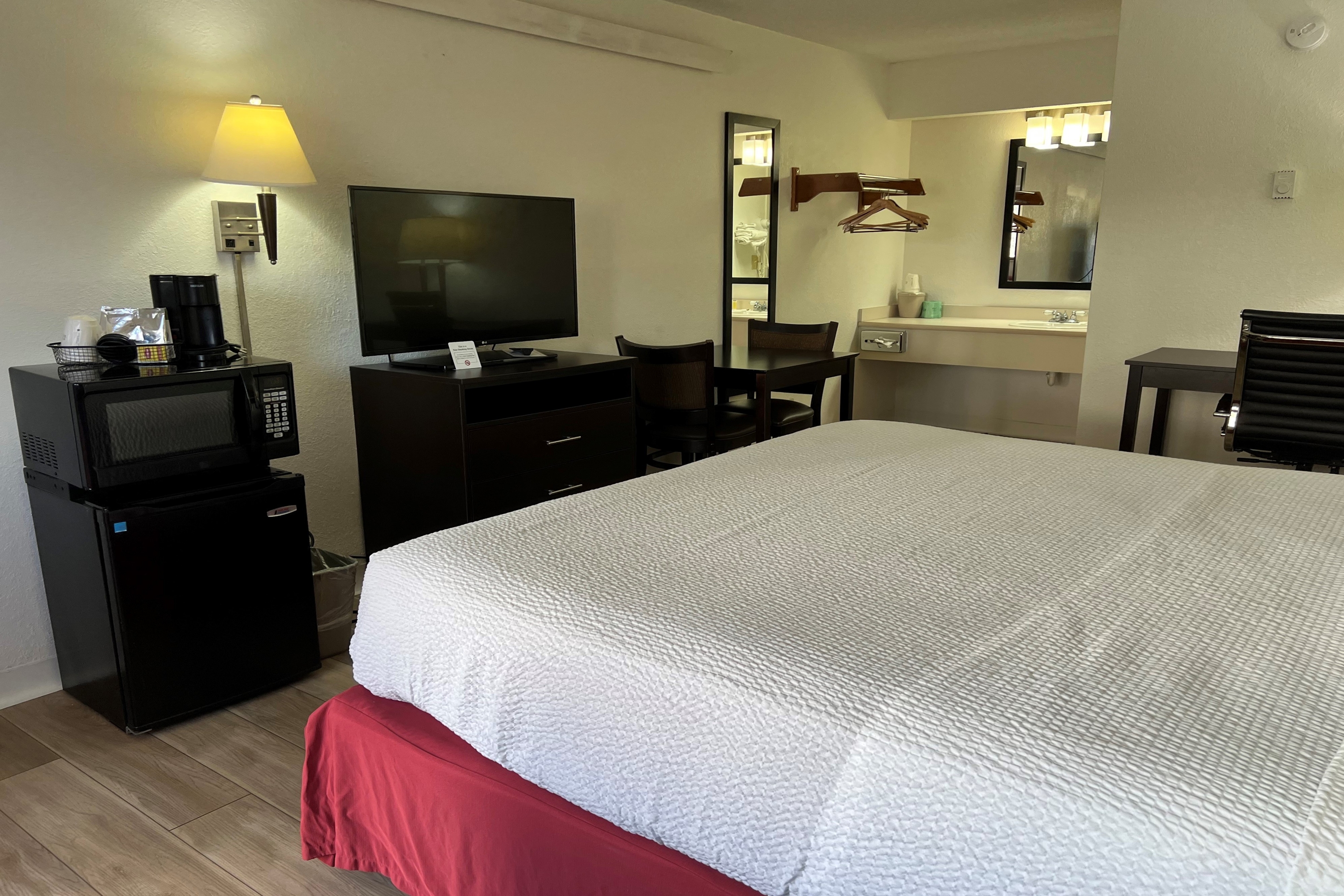 Guest room at the Days Inn by Wyndham Overland Park/Metcalf/Convention Center in Overland Park, Kansas