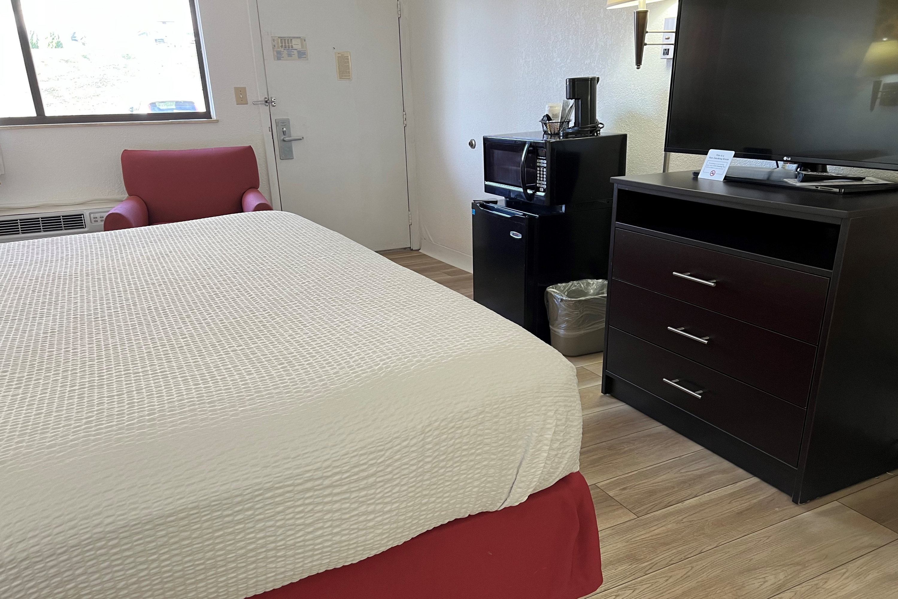 Guest room at the Days Inn by Wyndham Overland Park/Metcalf/Convention Center in Overland Park, Kansas