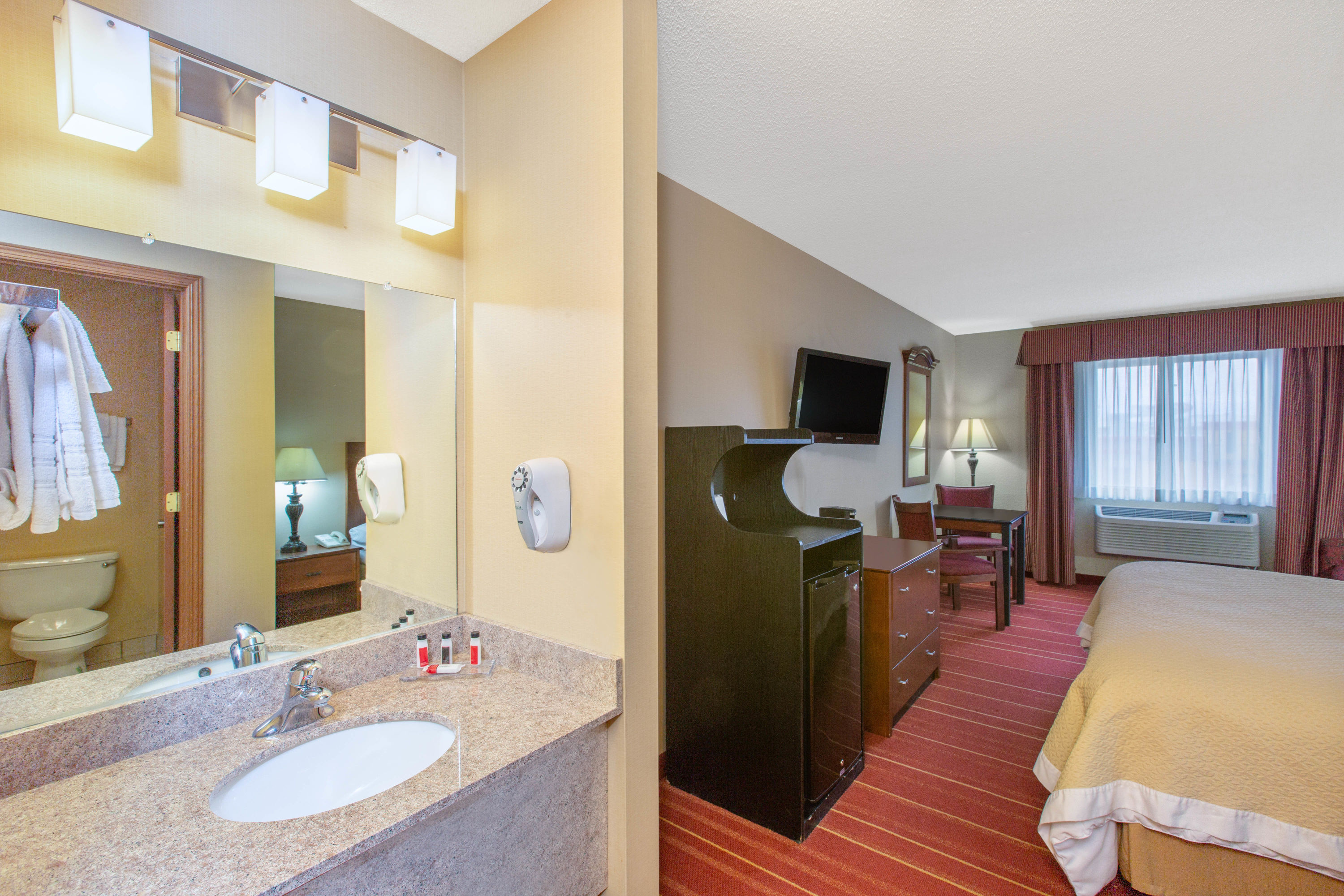 Guest room bath at the Days Inn by Wyndham Salina I-70 in Salina, Kansas