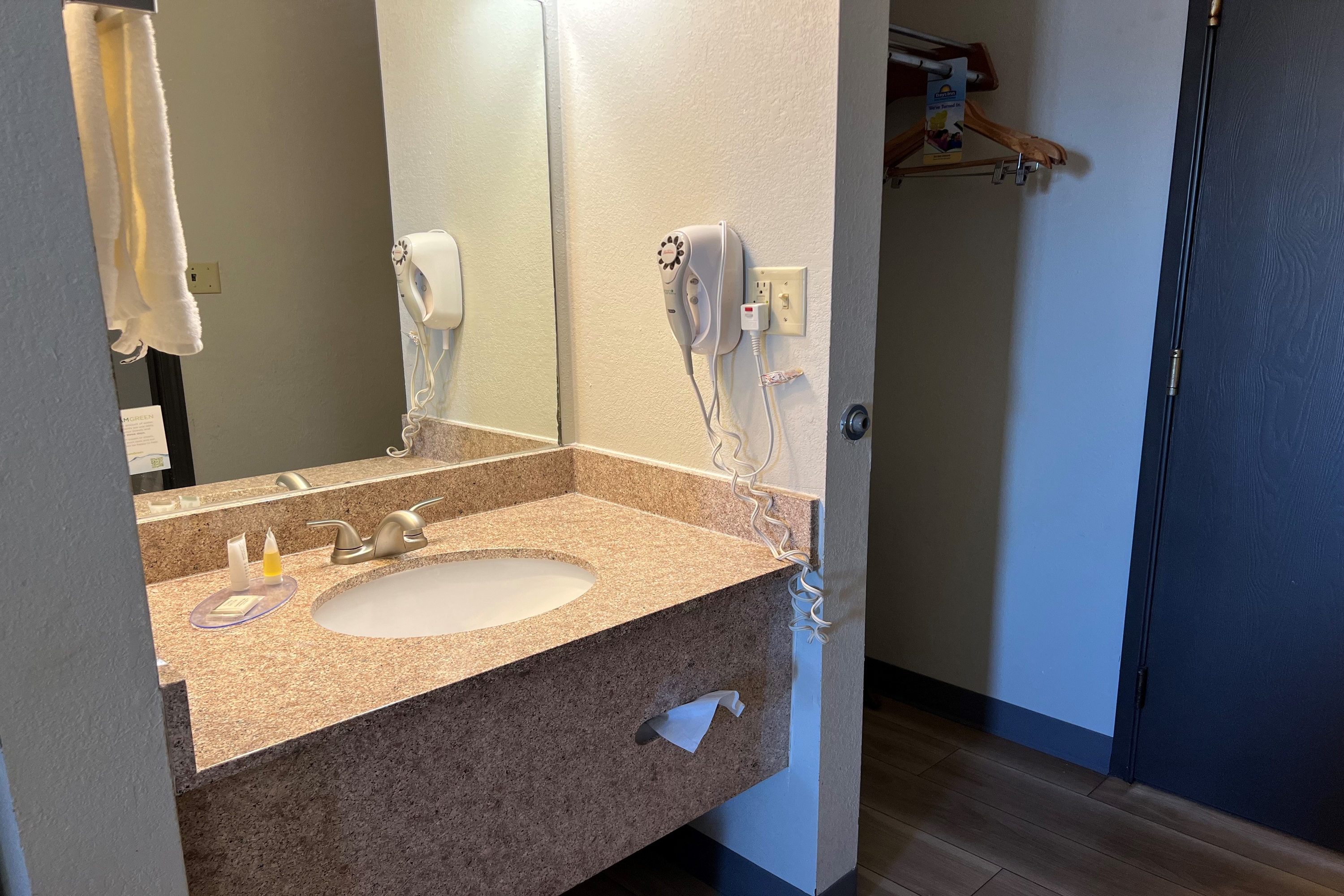 Guest room bath at the Days Inn by Wyndham Salina I-70 in Salina, Kansas