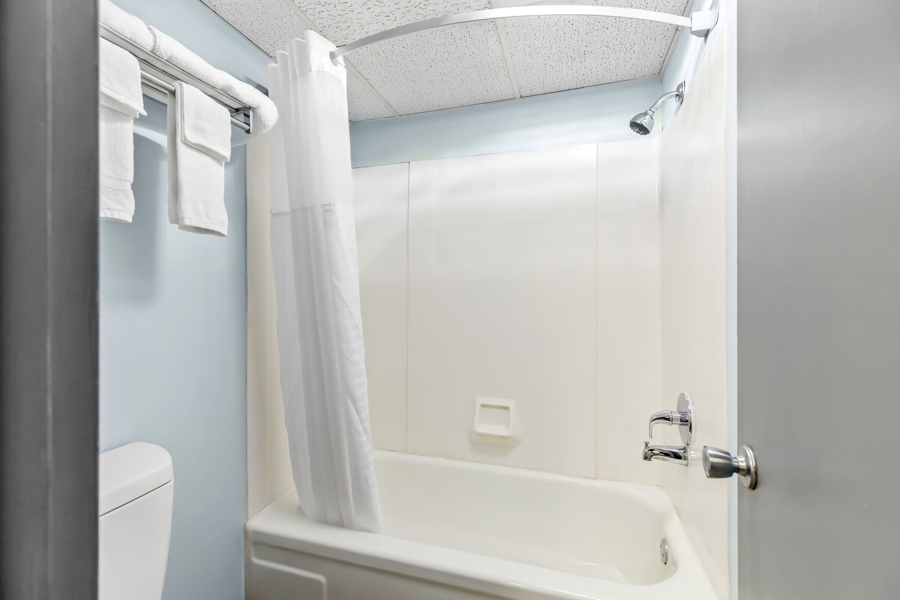 Guest room bath at the Days Inn by Wyndham Salina South in Salina, Kansas