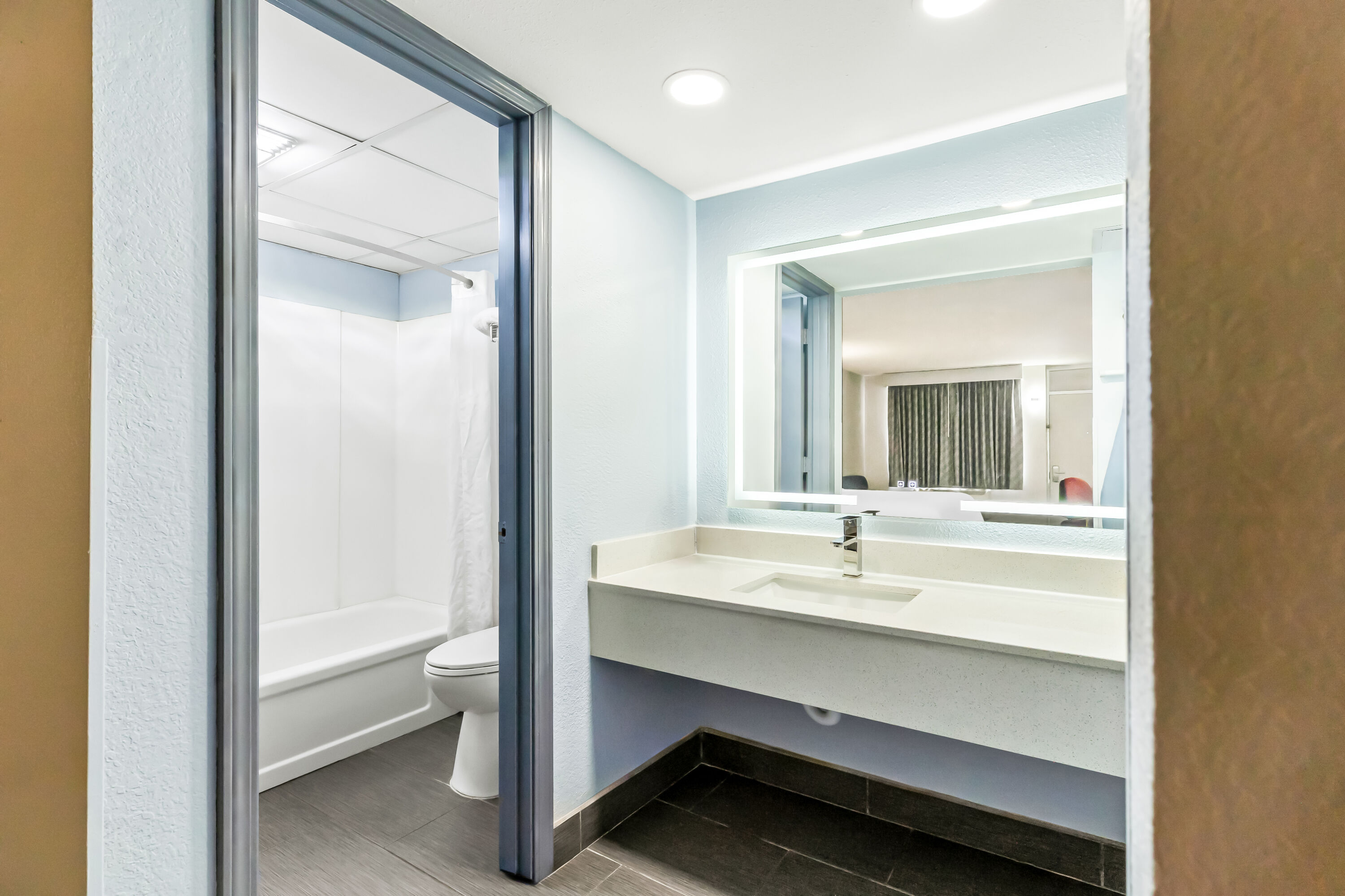 Guest room bath at the Days Inn by Wyndham Salina South in Salina, Kansas
