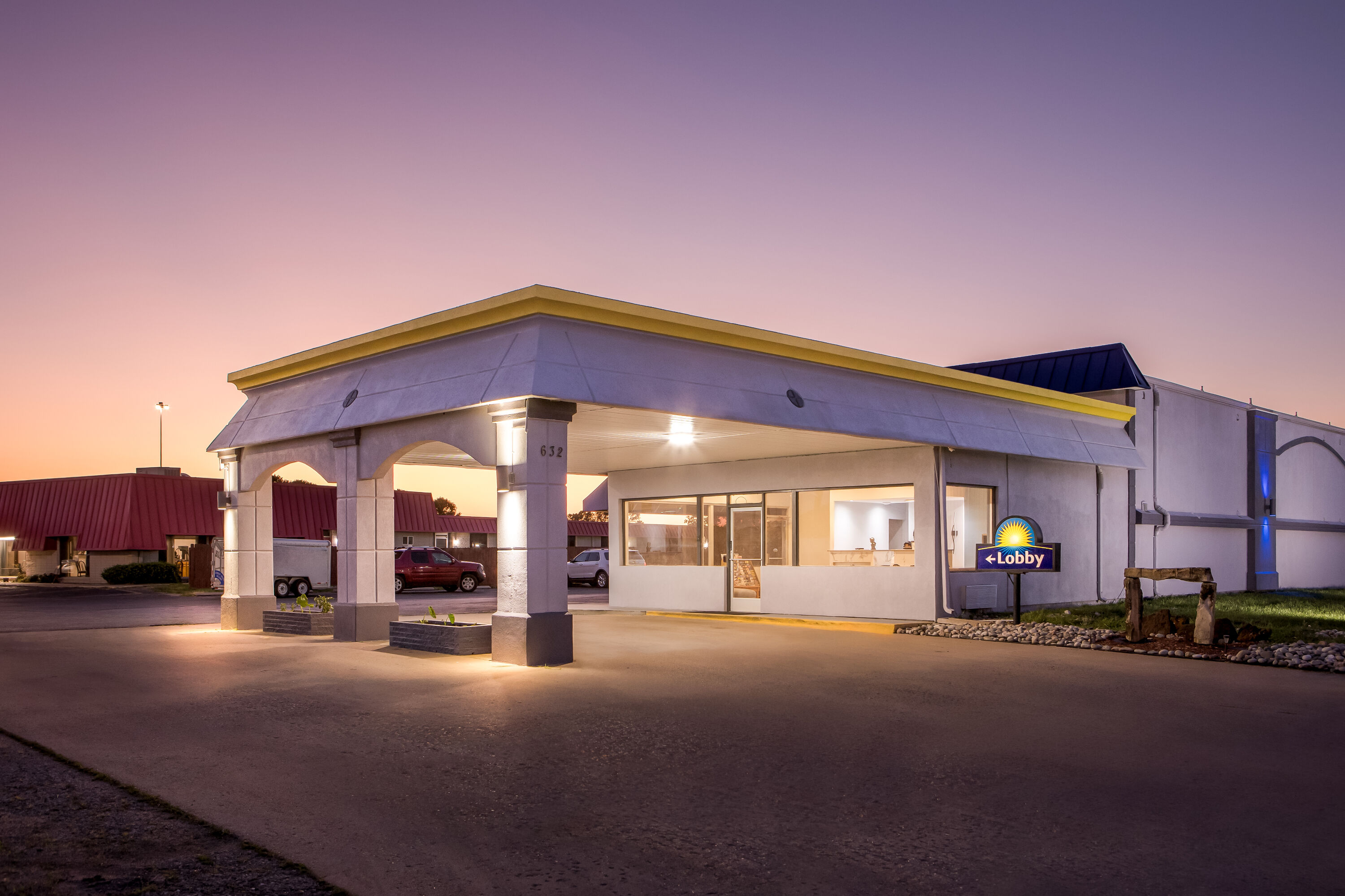 Exterior Night Image of Days Inn by Wyndham Salina South hotel in Salina, Kansas