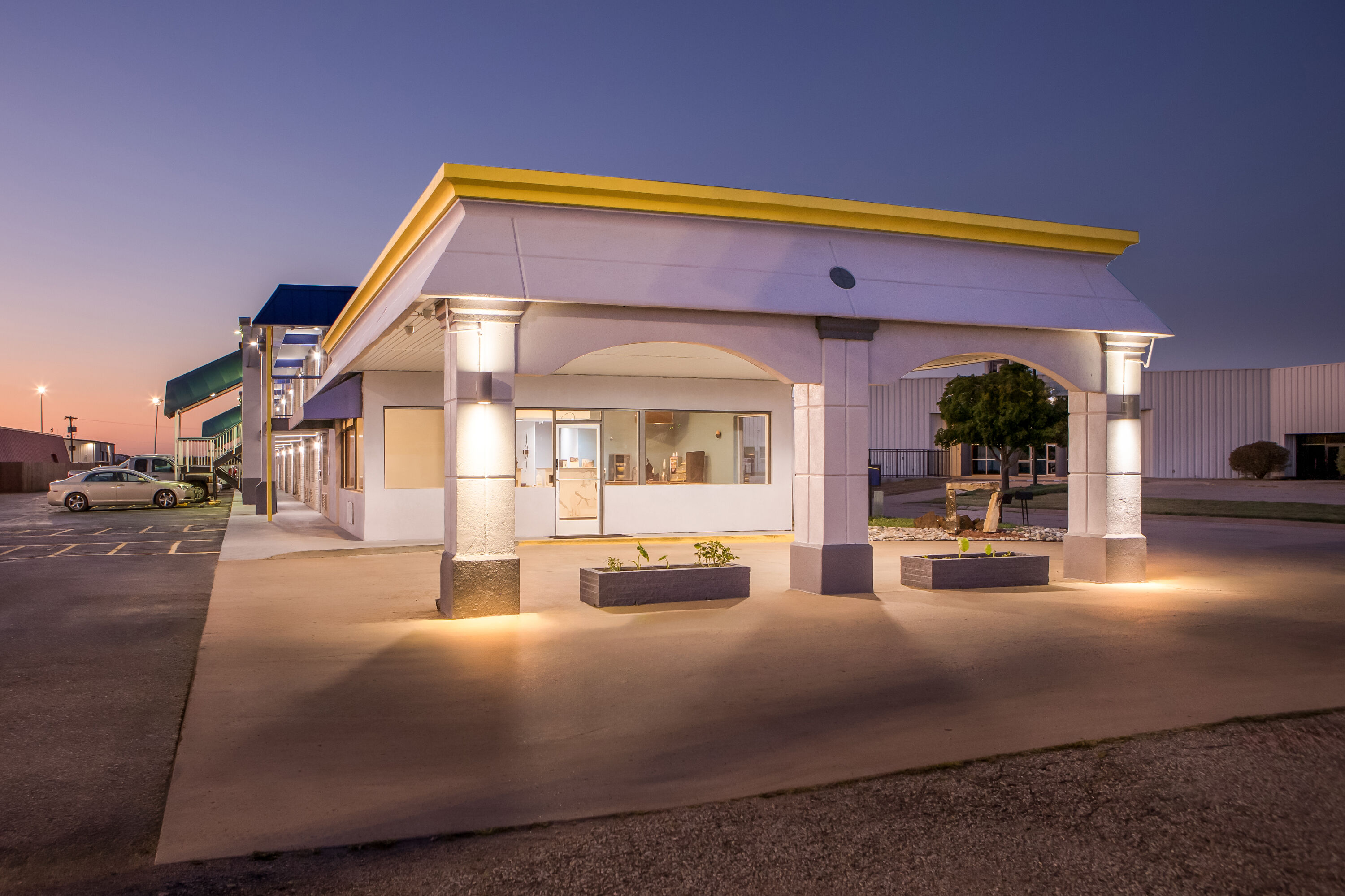 Exterior Night Image of Days Inn by Wyndham Salina South hotel in Salina, Kansas