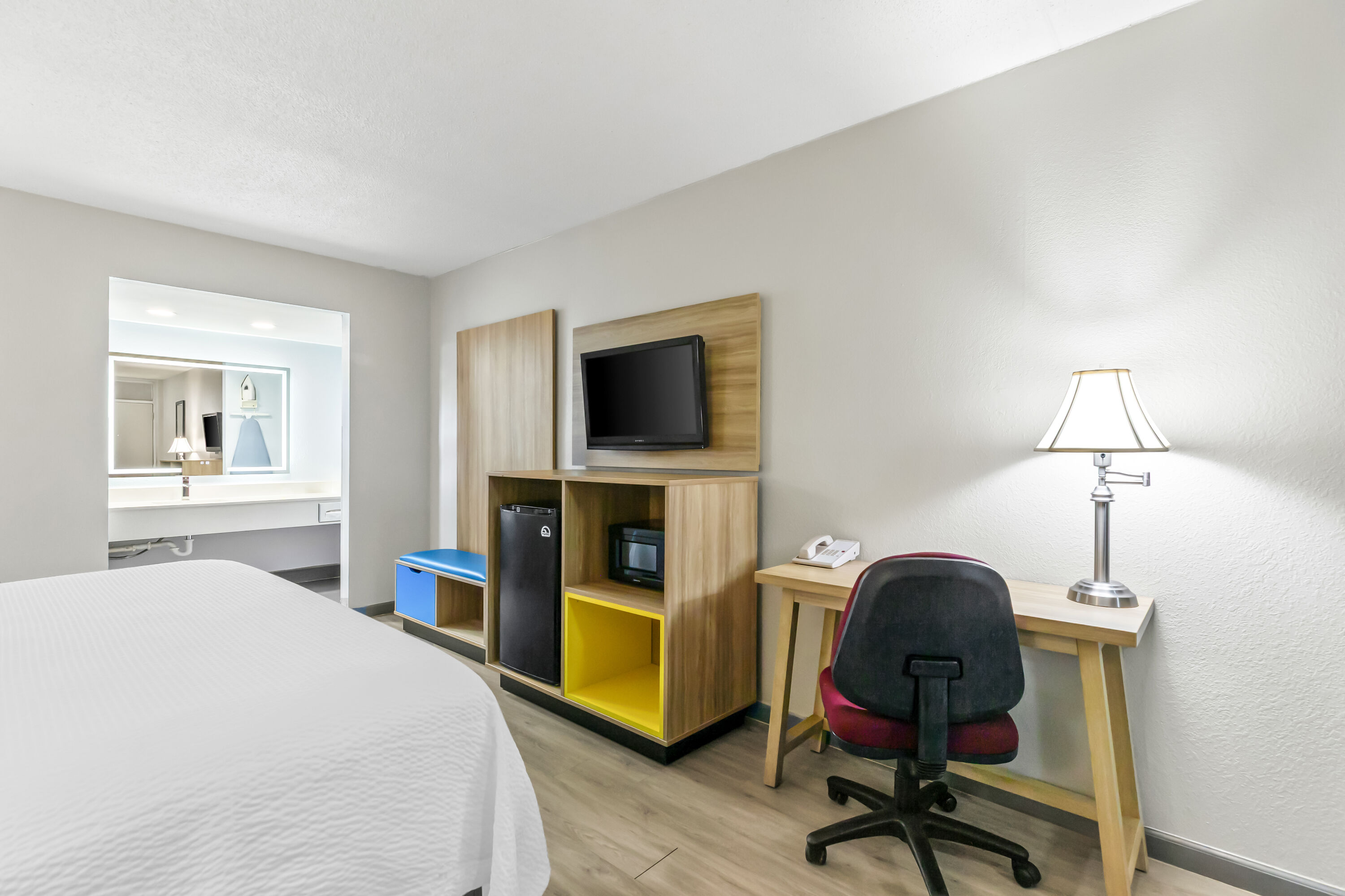 King bed guest room at the Days Inn by Wyndham Salina South in Salina, Kansas