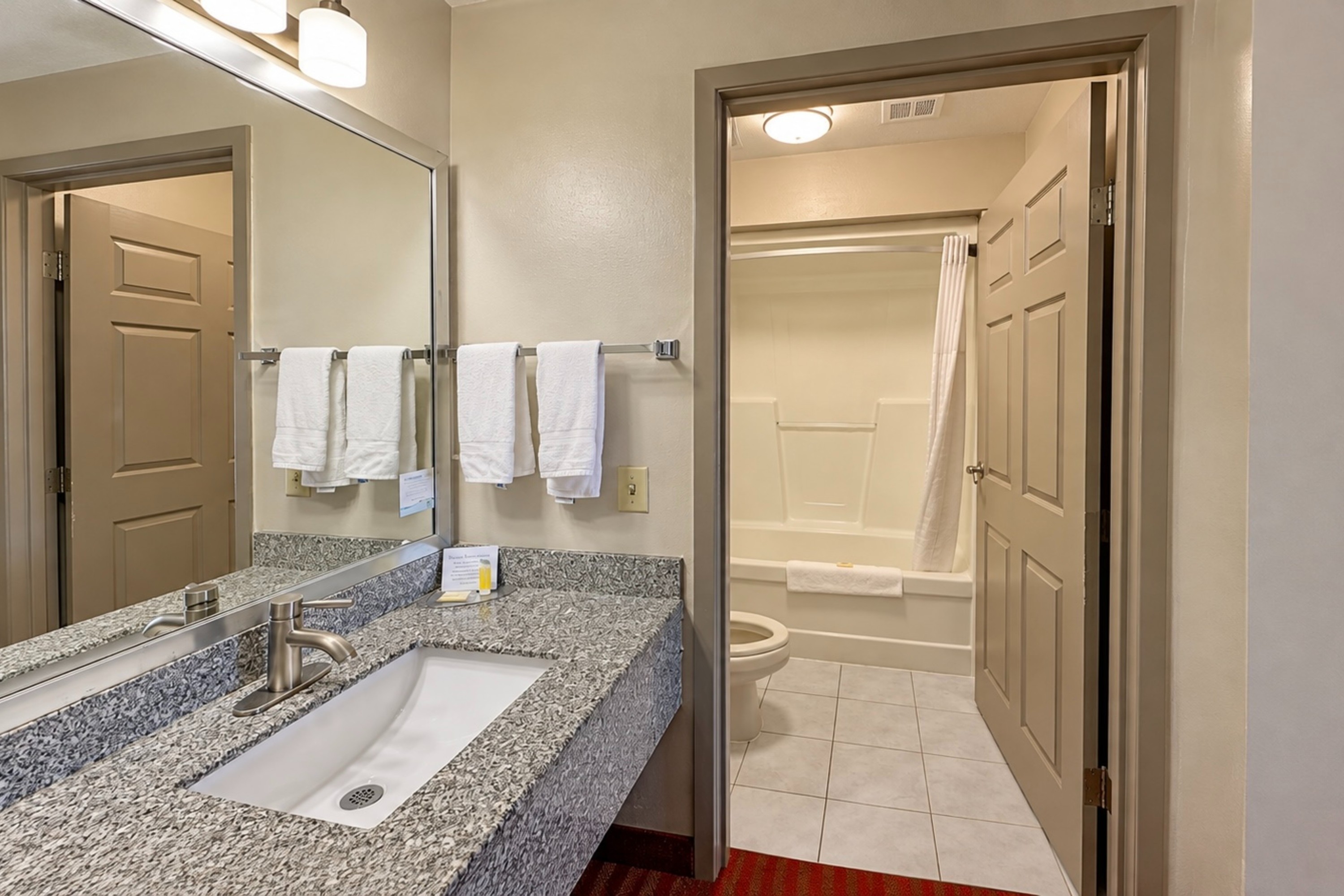 Guest room bath at the Days Inn by Wyndham Franklin in Franklin, Kentucky