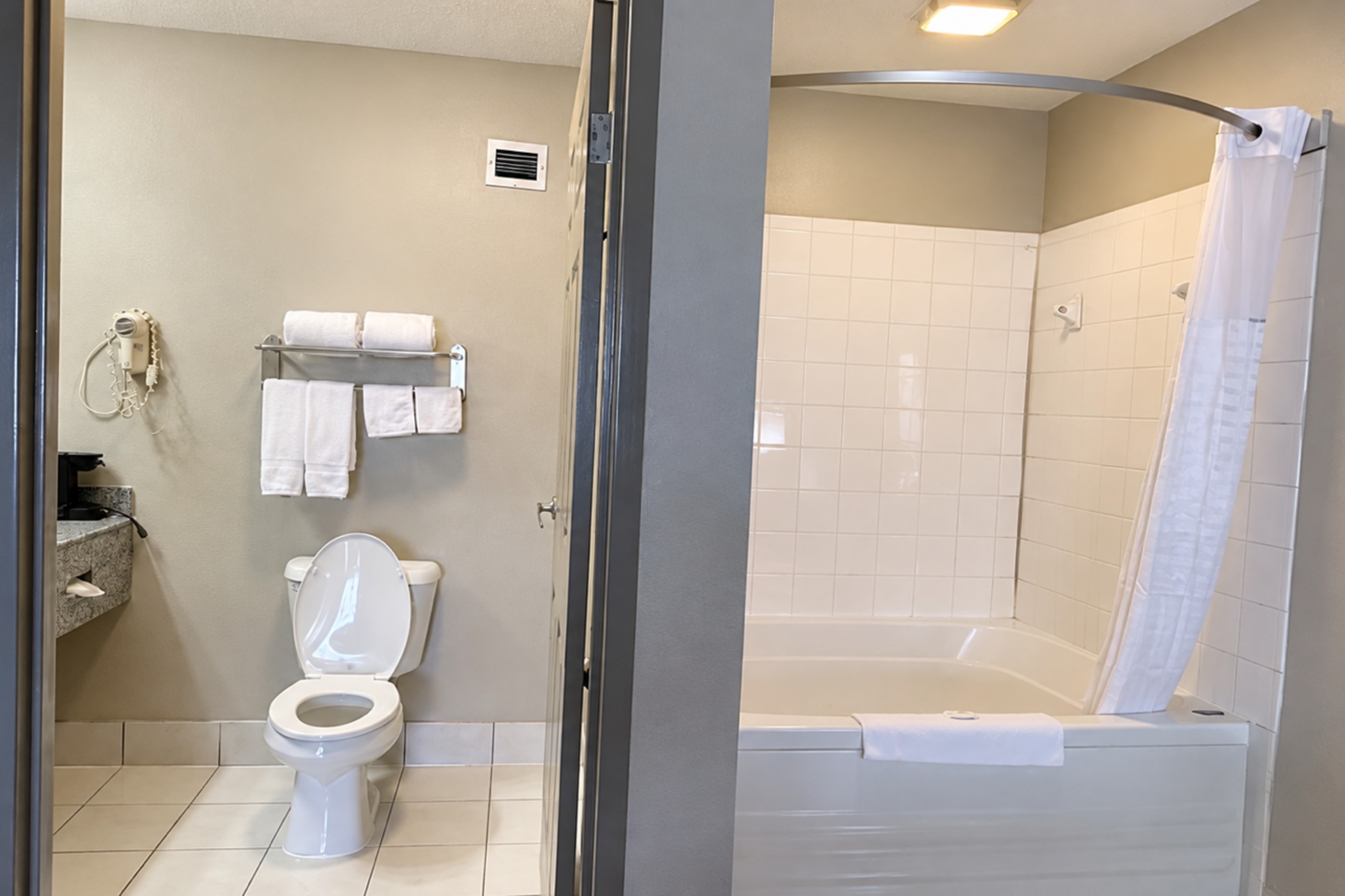 Guest room bath at the Days Inn by Wyndham Franklin in Franklin, Kentucky