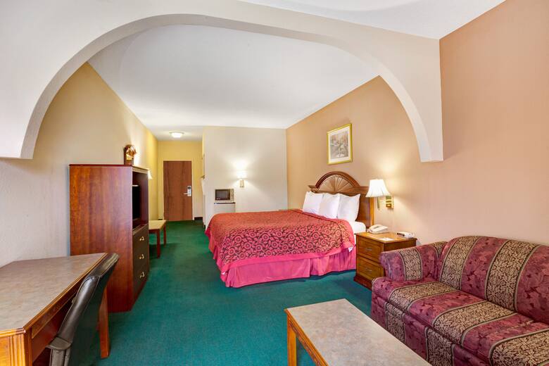 Guest room at the Days Inn & Suites Louisville SW in Louisville, Kentucky