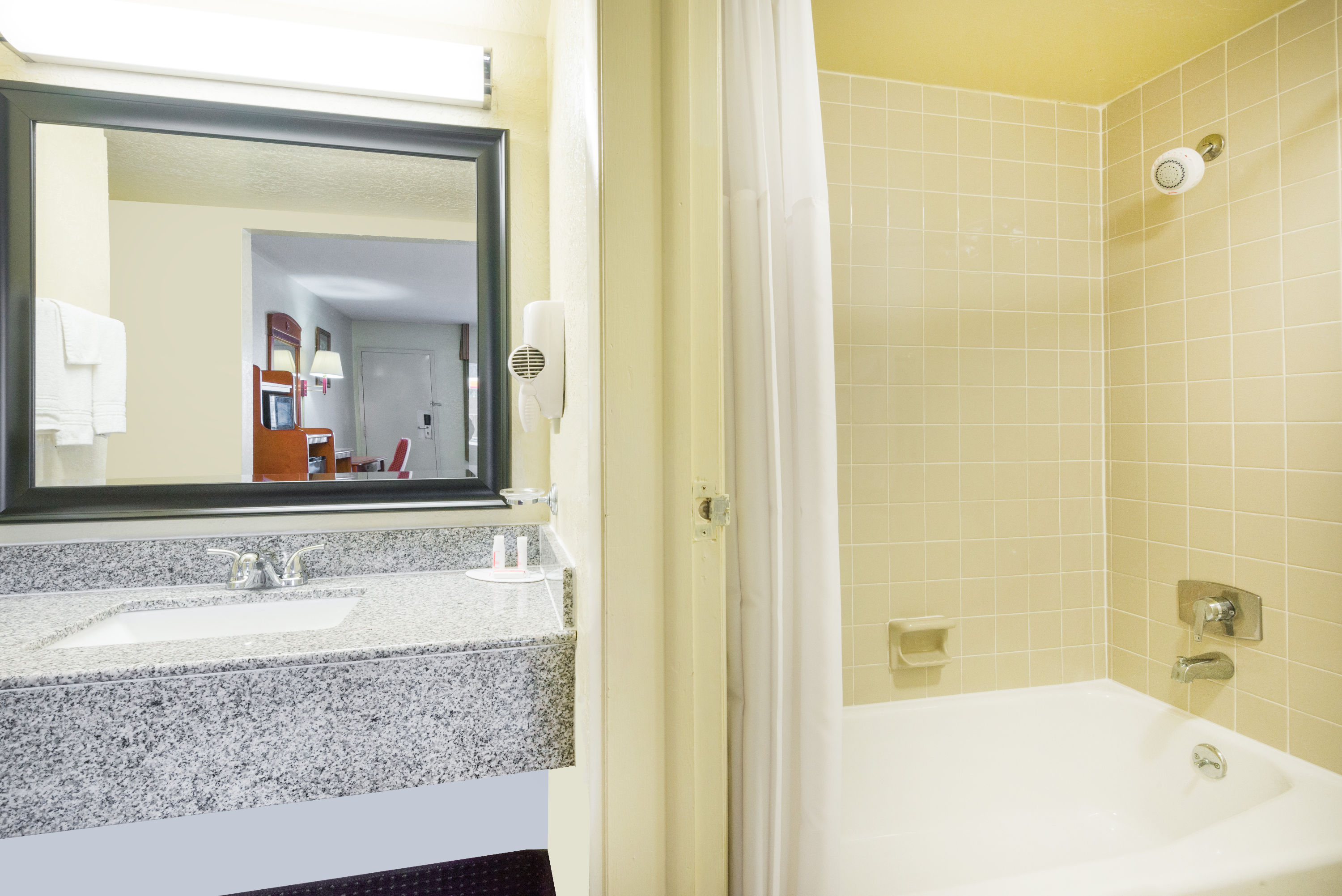 Guest room bath at the Days Inn by Wyndham Paintsville in Paintsville, Kentucky