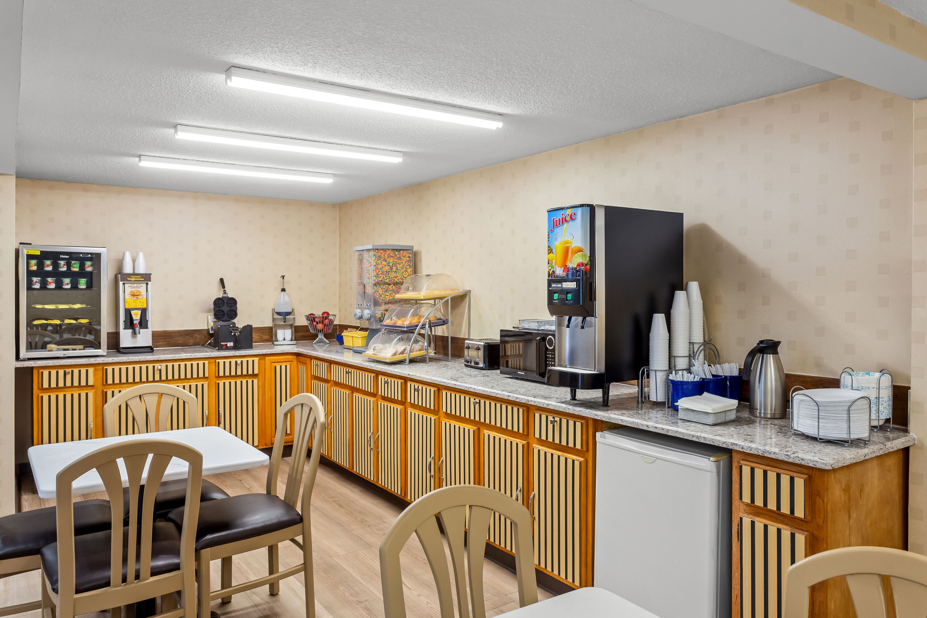 Days Inn by Wyndham Paintsville restaurant breakfast area with seating in Paintsville, Kentucky