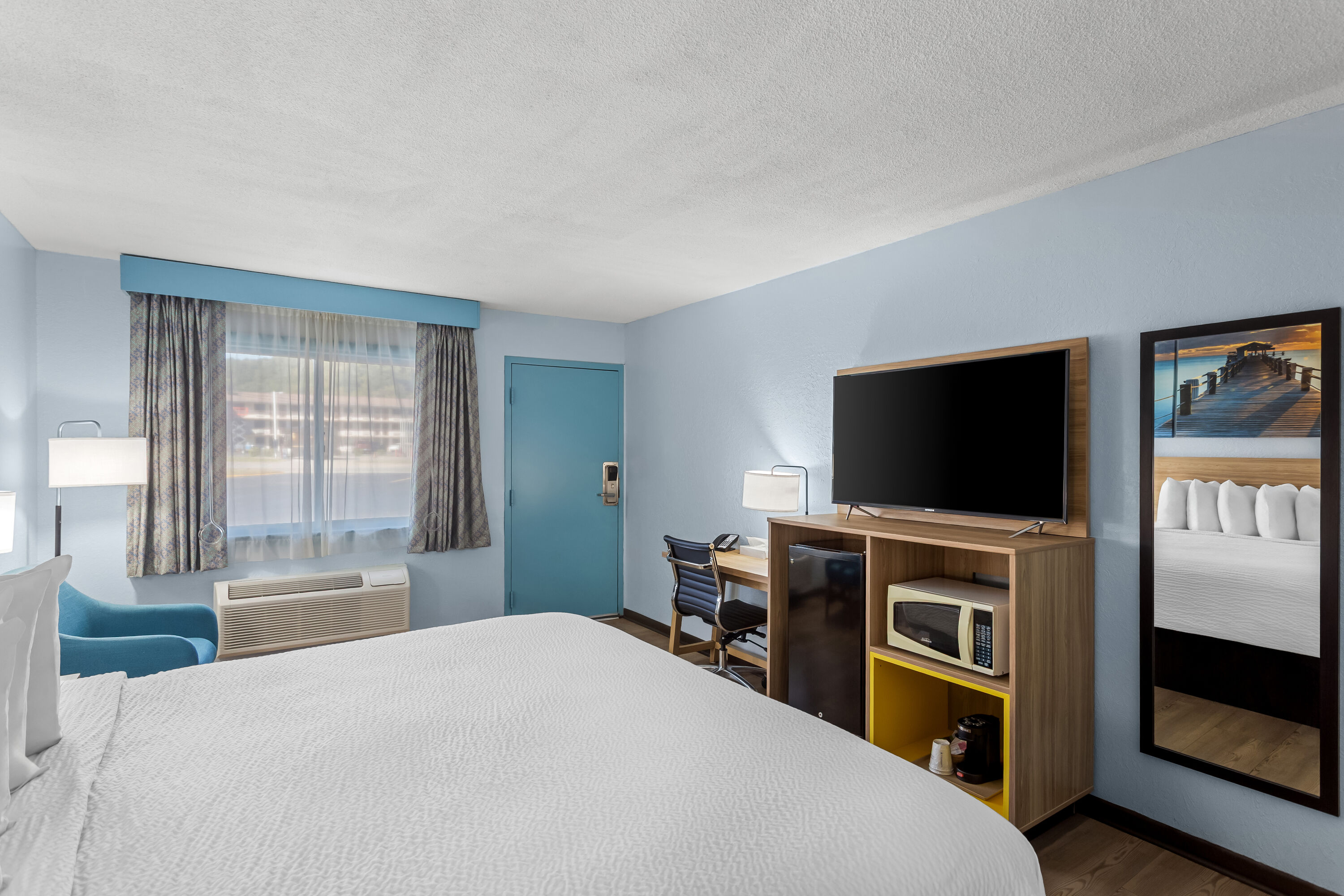 King bed guest room at the Days Inn by Wyndham Paintsville in Paintsville, Kentucky