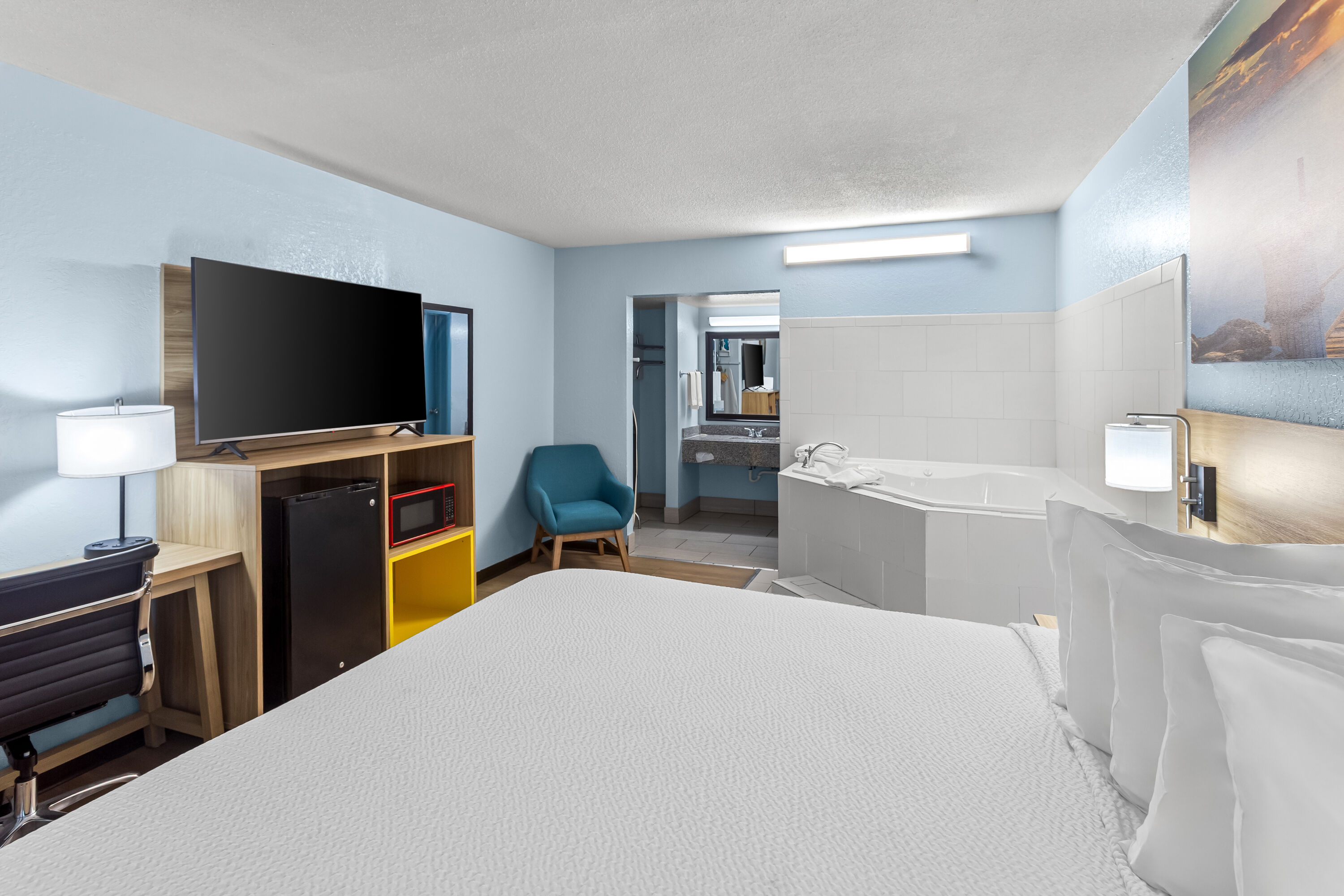 King bed guest room at the Days Inn by Wyndham Paintsville in Paintsville, Kentucky