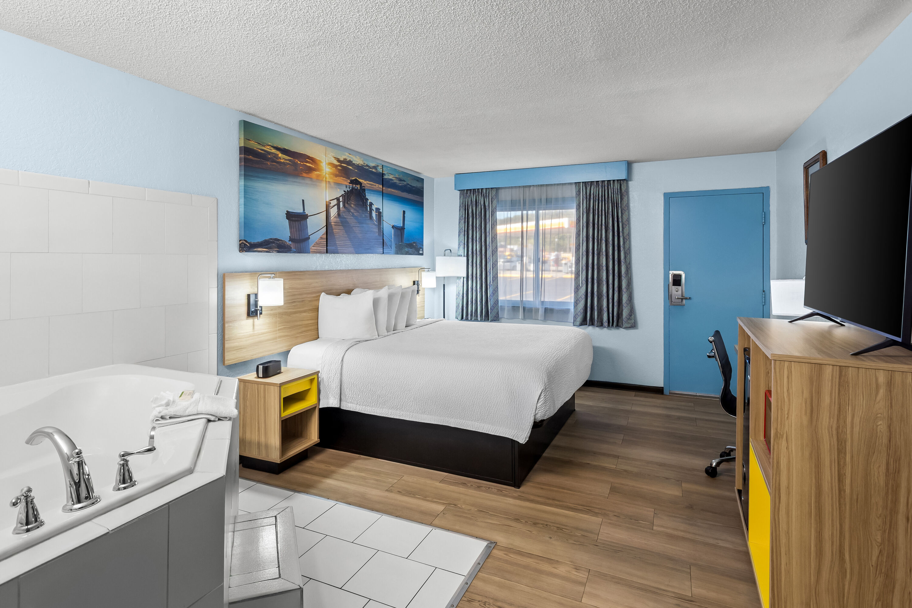 King bed guest room at the Days Inn by Wyndham Paintsville in Paintsville, Kentucky