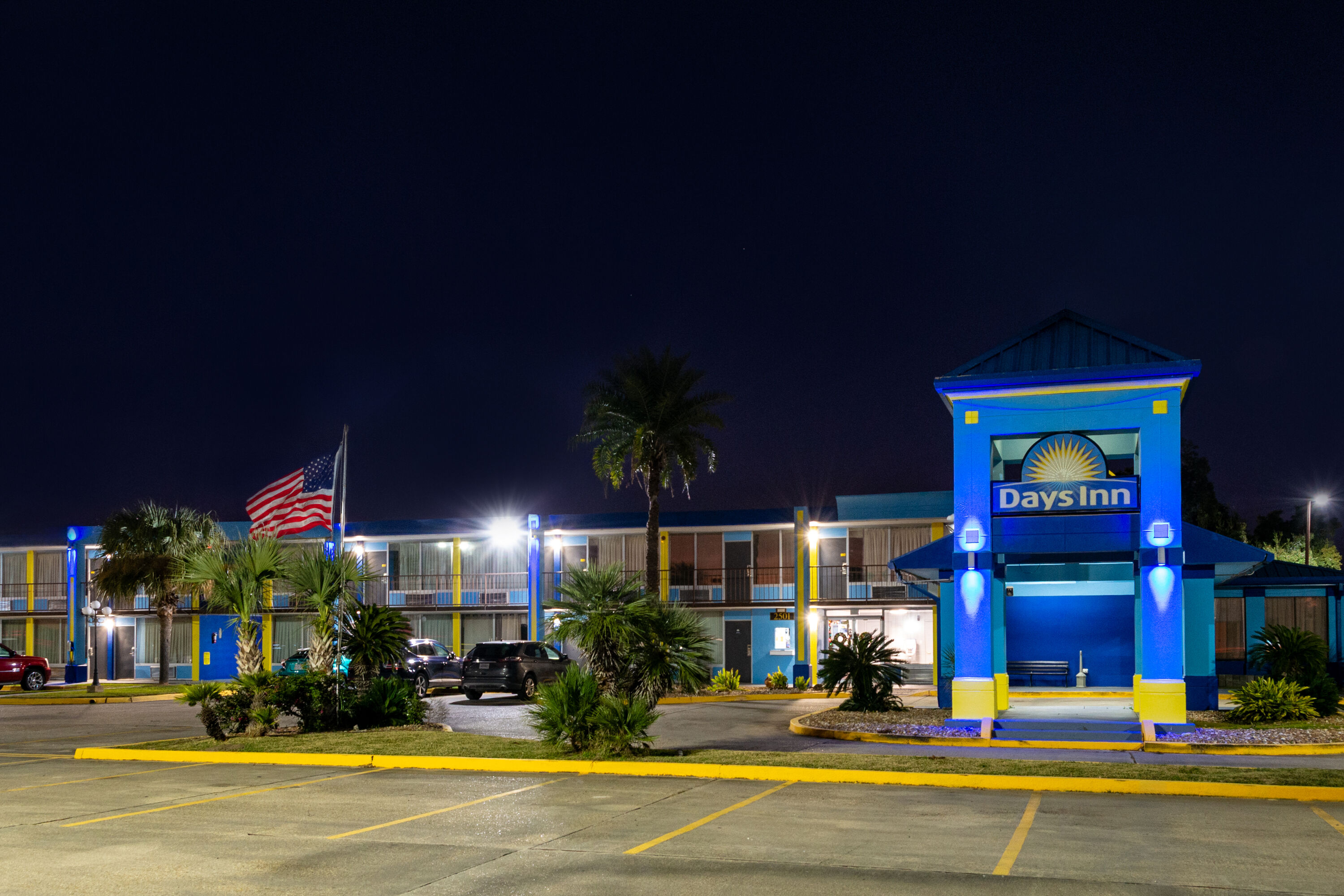 Exterior Night Image of Days Inn by Wyndham Lafayette Near Lafayette Airport hotel in Lafayette, Louisiana