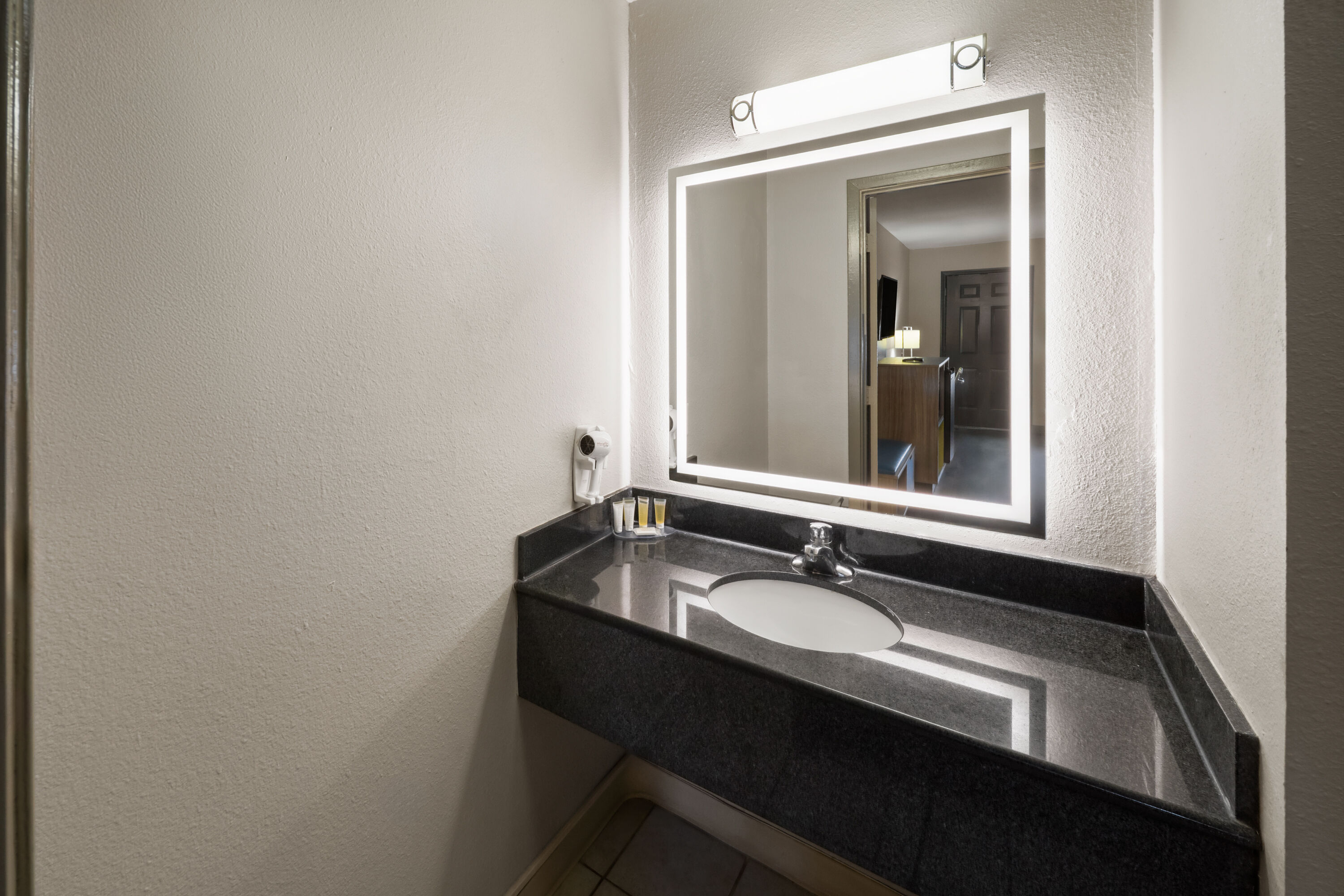 Guest room bath at the Days Inn by Wyndham Natchitoches in Natchitoches, Louisiana