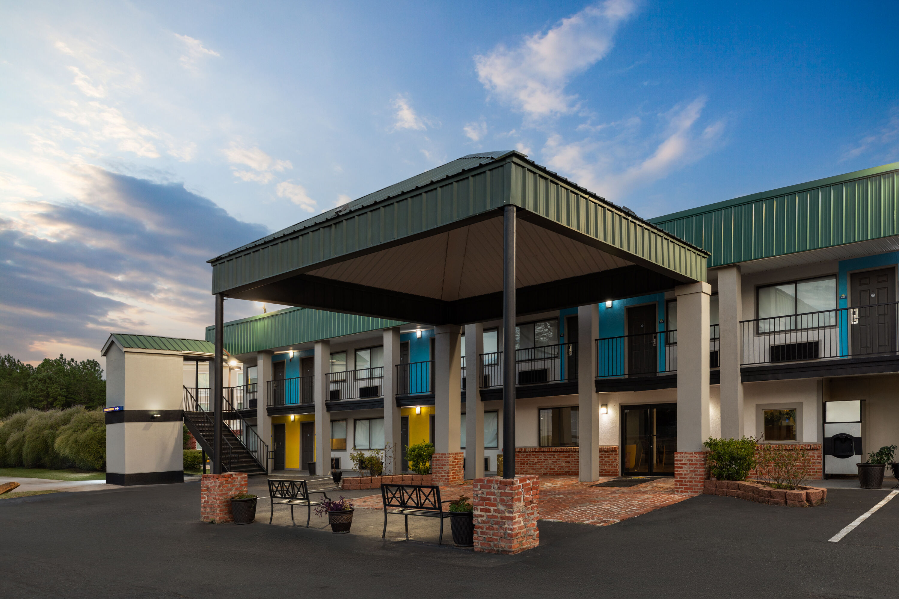 Exterior Dusk Image of Days Inn by Wyndham Natchitoches hotel in Natchitoches, Louisiana