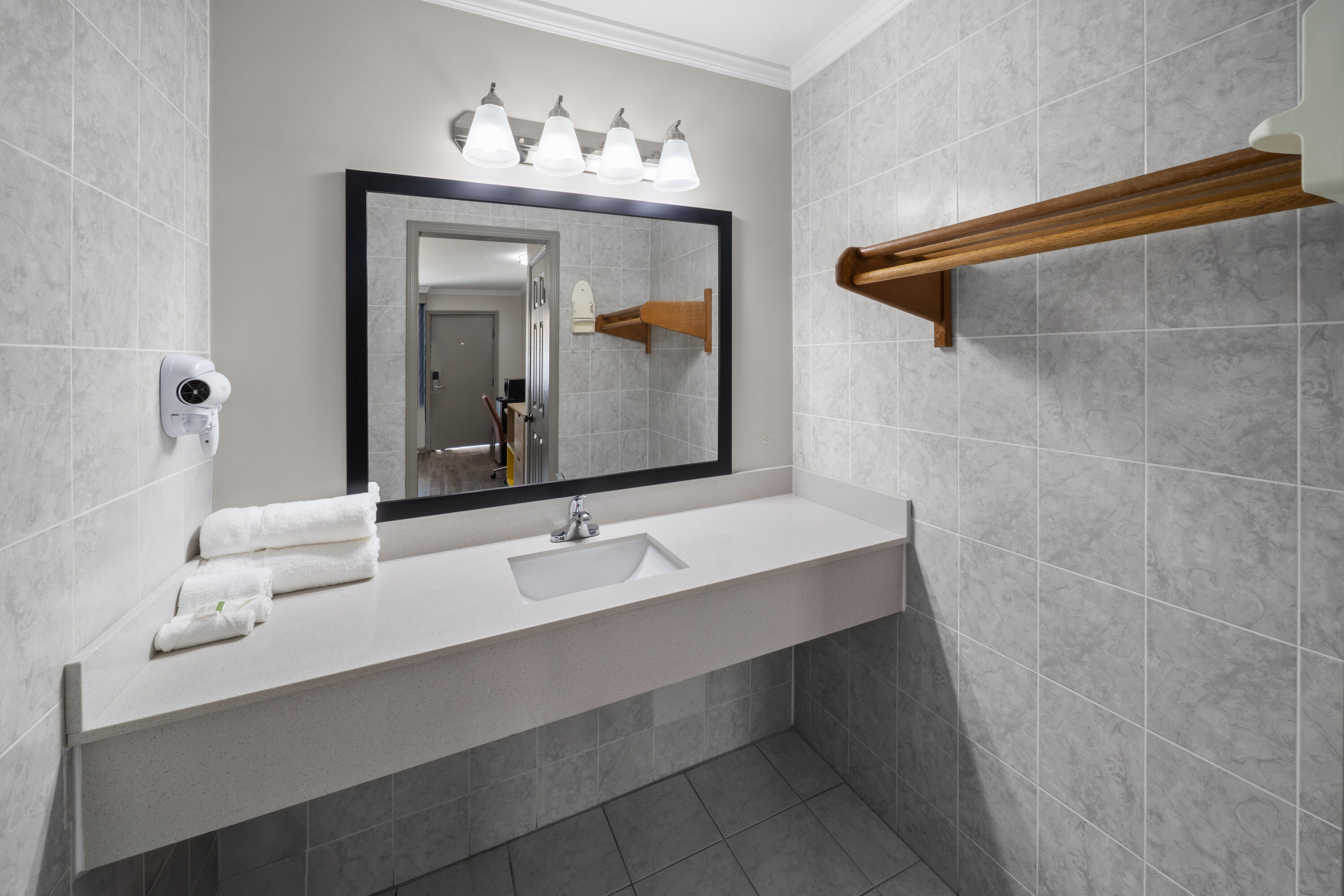 Guest room bath at the Days Inn by Wyndham Slidell in Slidell, Louisiana