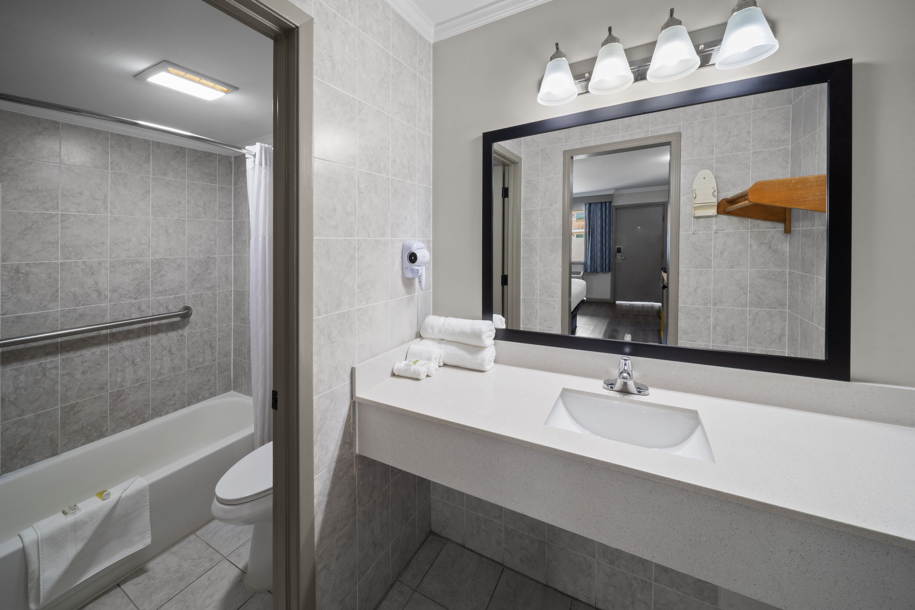 Guest room bath at the Days Inn by Wyndham Slidell in Slidell, Louisiana