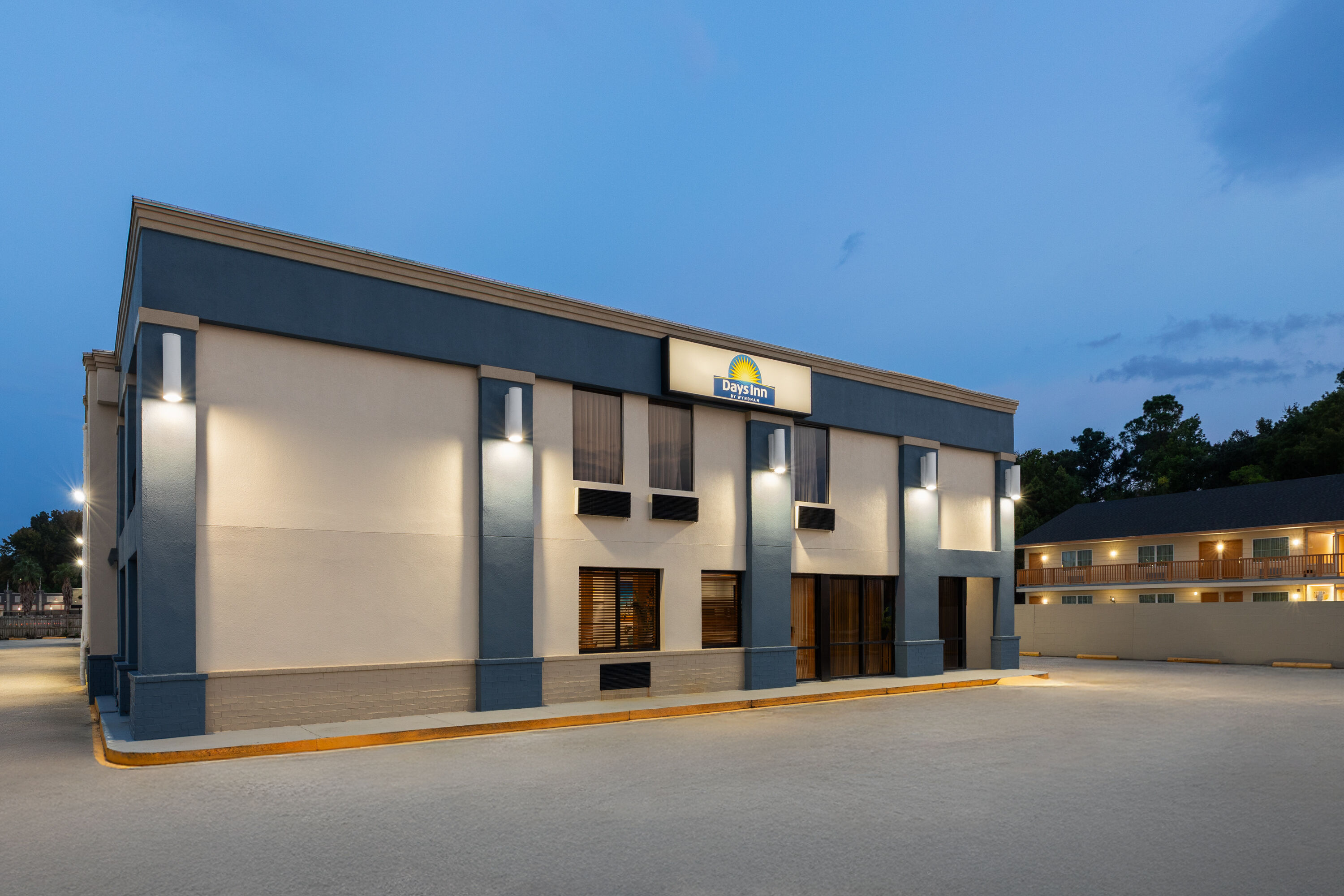 Exterior Dusk Image of Days Inn by Wyndham Slidell hotel in Slidell, Louisiana