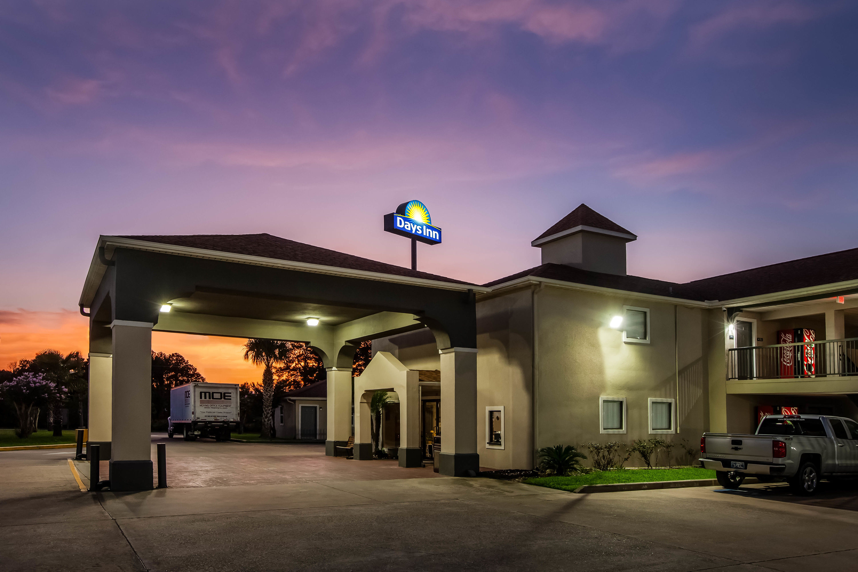 Exterior Dusk Image of Days Inn by Wyndham Sulphur LA hotel in Sulphur, Louisiana