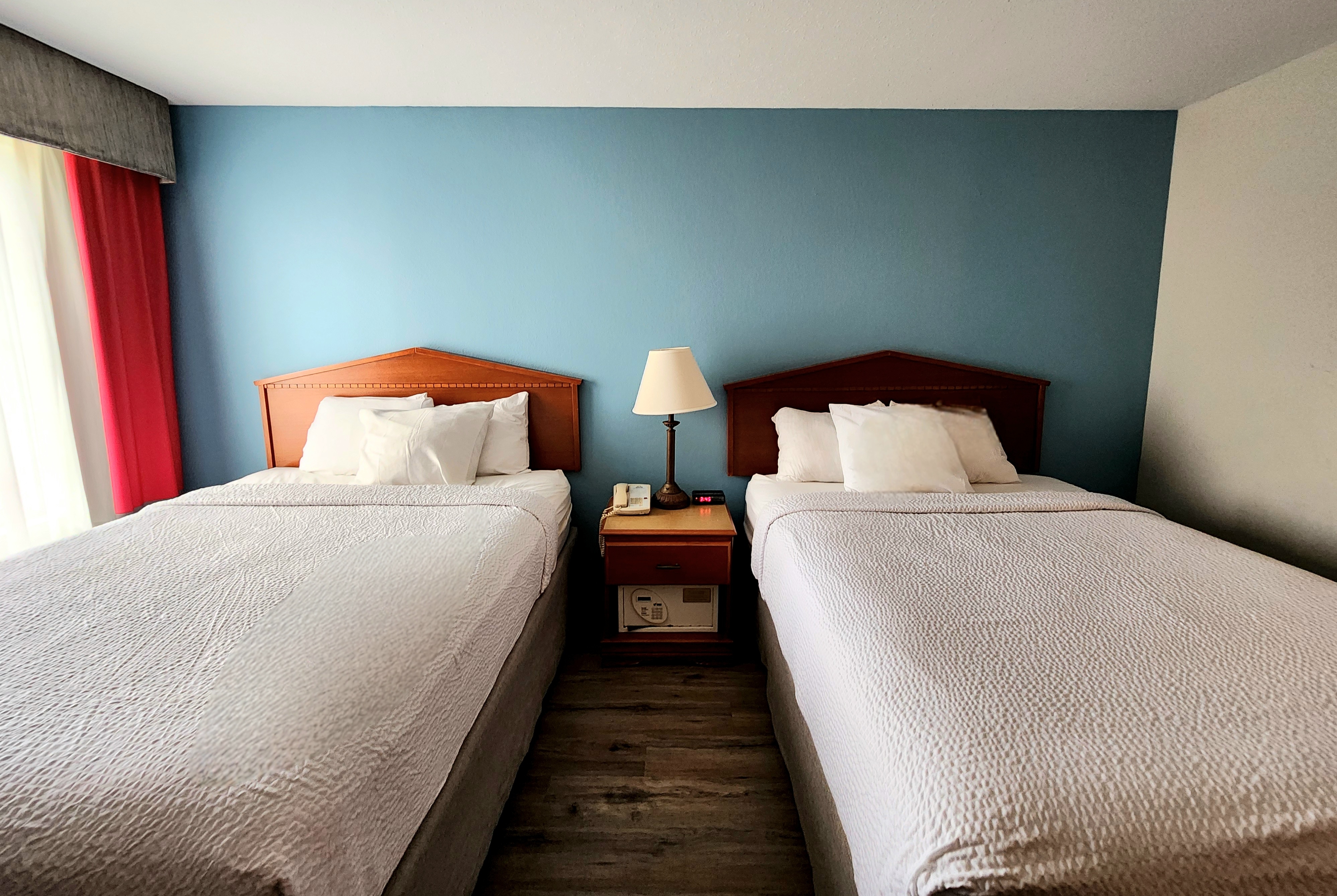 Guest room at the Days Inn & Suites by Wyndham Thibodaux in Thibodaux, Louisiana