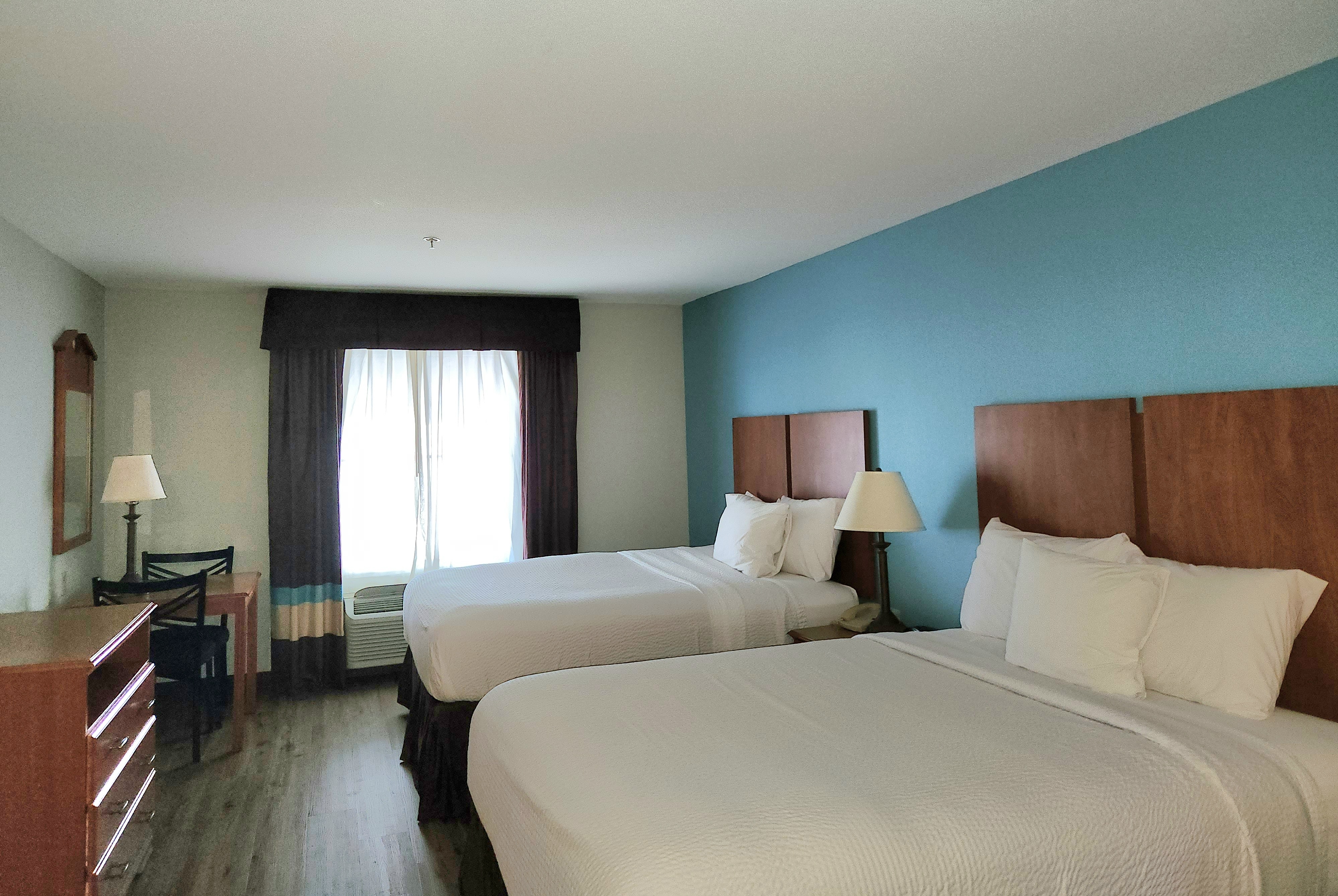 Guest room at the Days Inn & Suites by Wyndham Thibodaux in Thibodaux, Louisiana