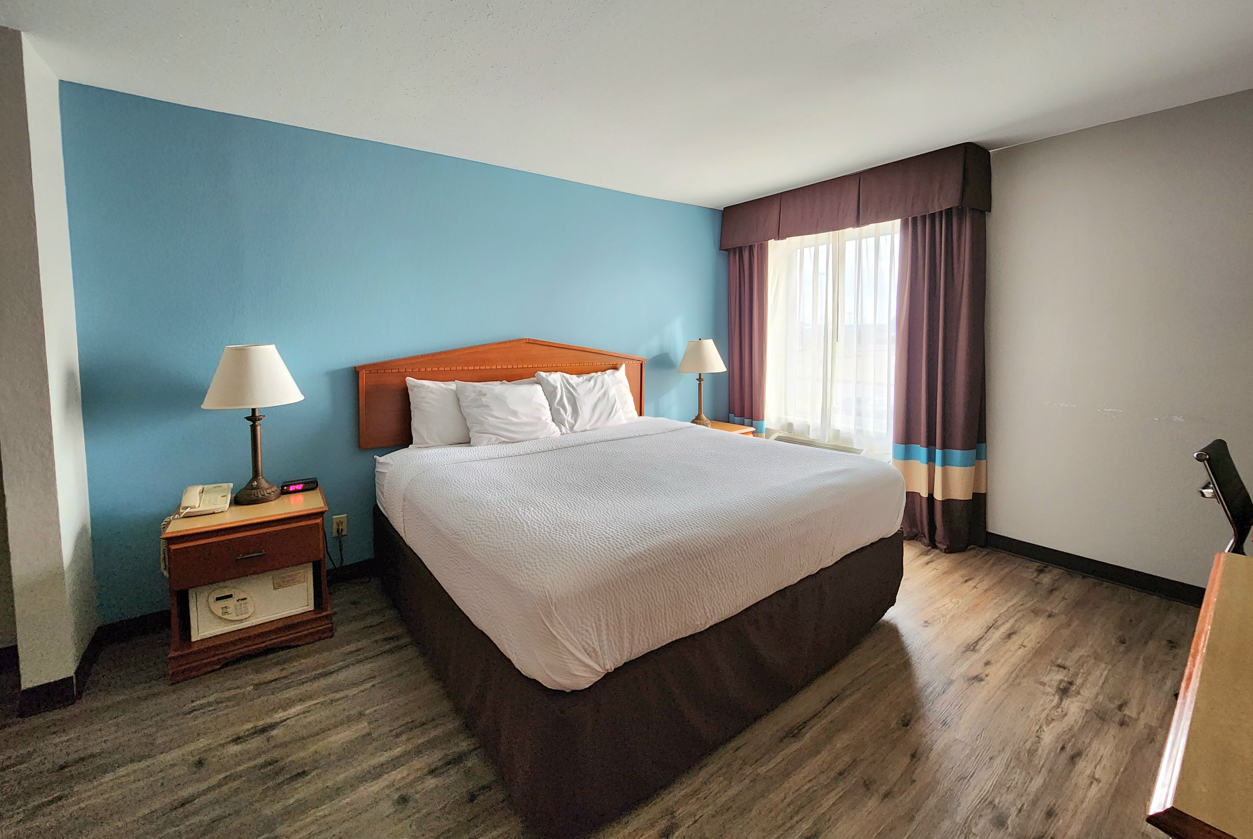 Guest room at the Days Inn & Suites by Wyndham Thibodaux in Thibodaux, Louisiana