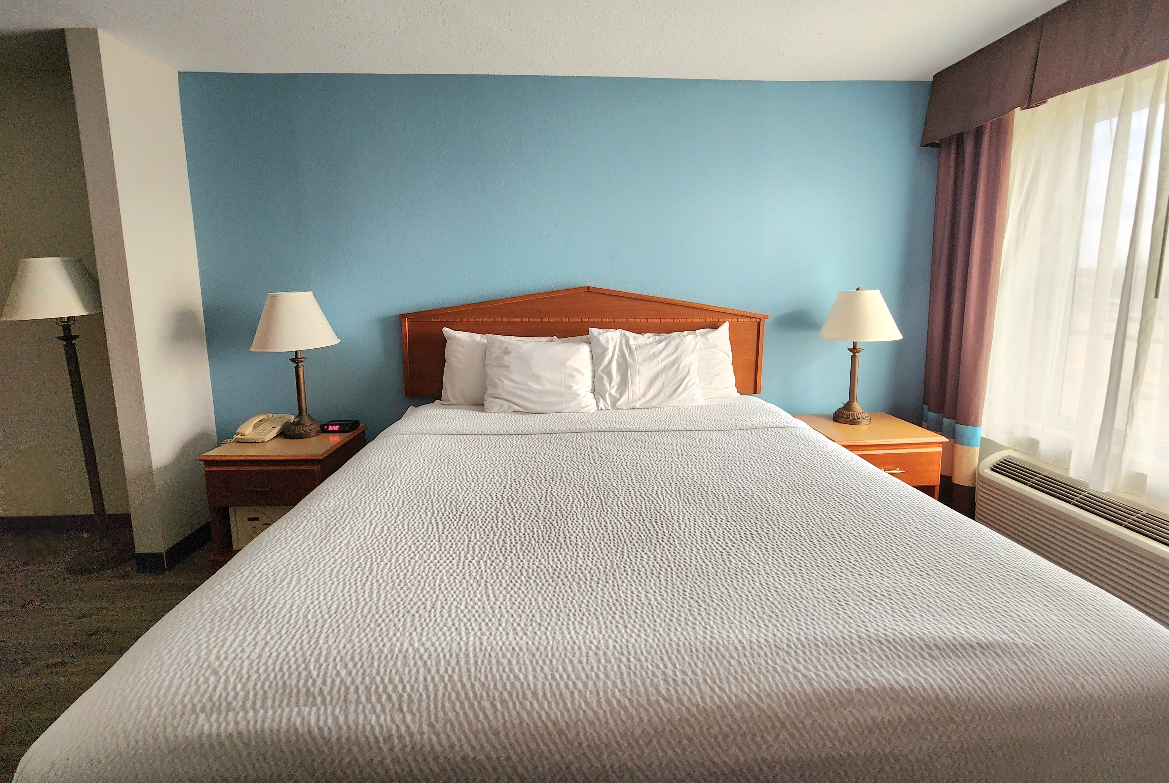 Guest room at the Days Inn & Suites by Wyndham Thibodaux in Thibodaux, Louisiana