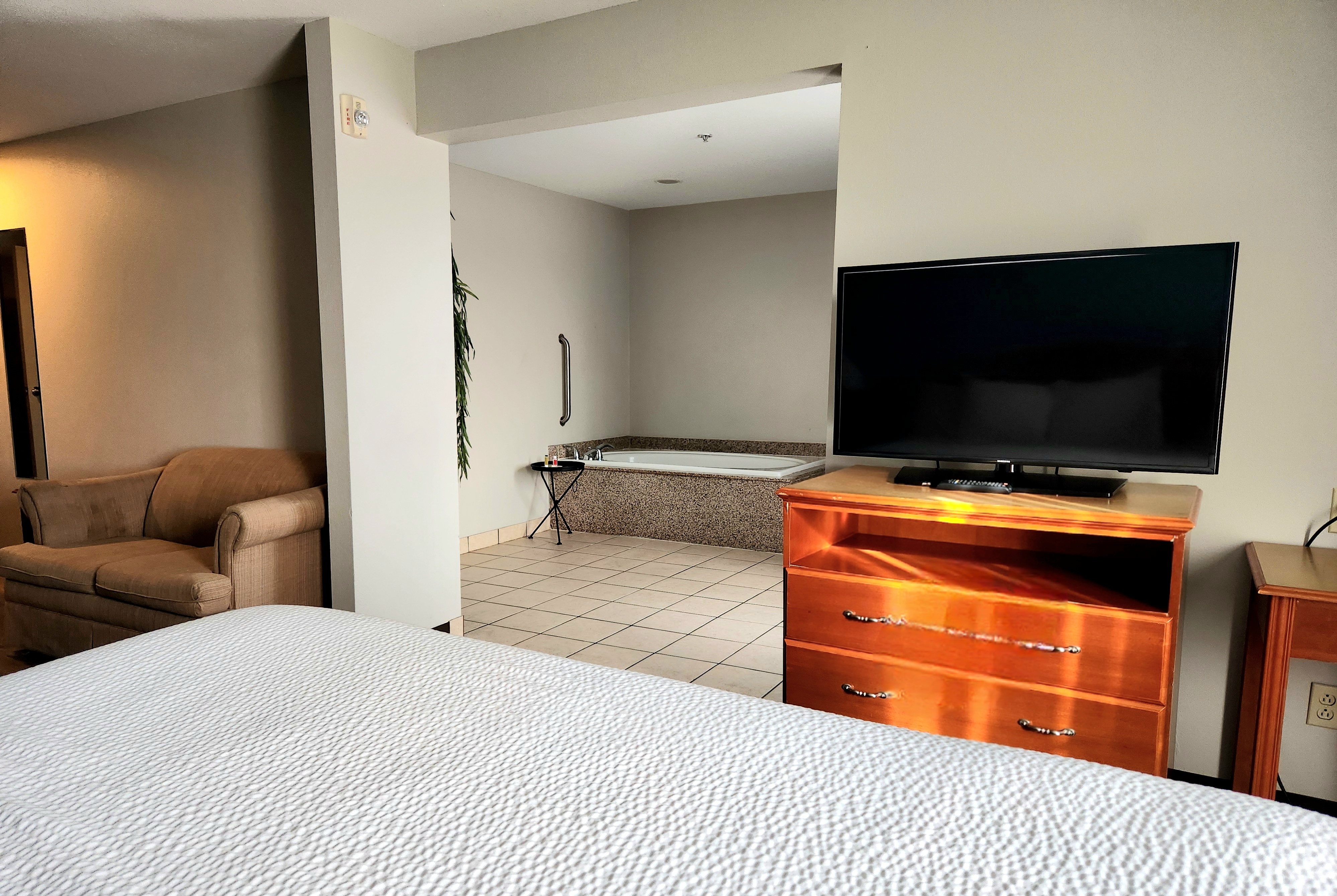 Guest room at the Days Inn & Suites by Wyndham Thibodaux in Thibodaux, Louisiana