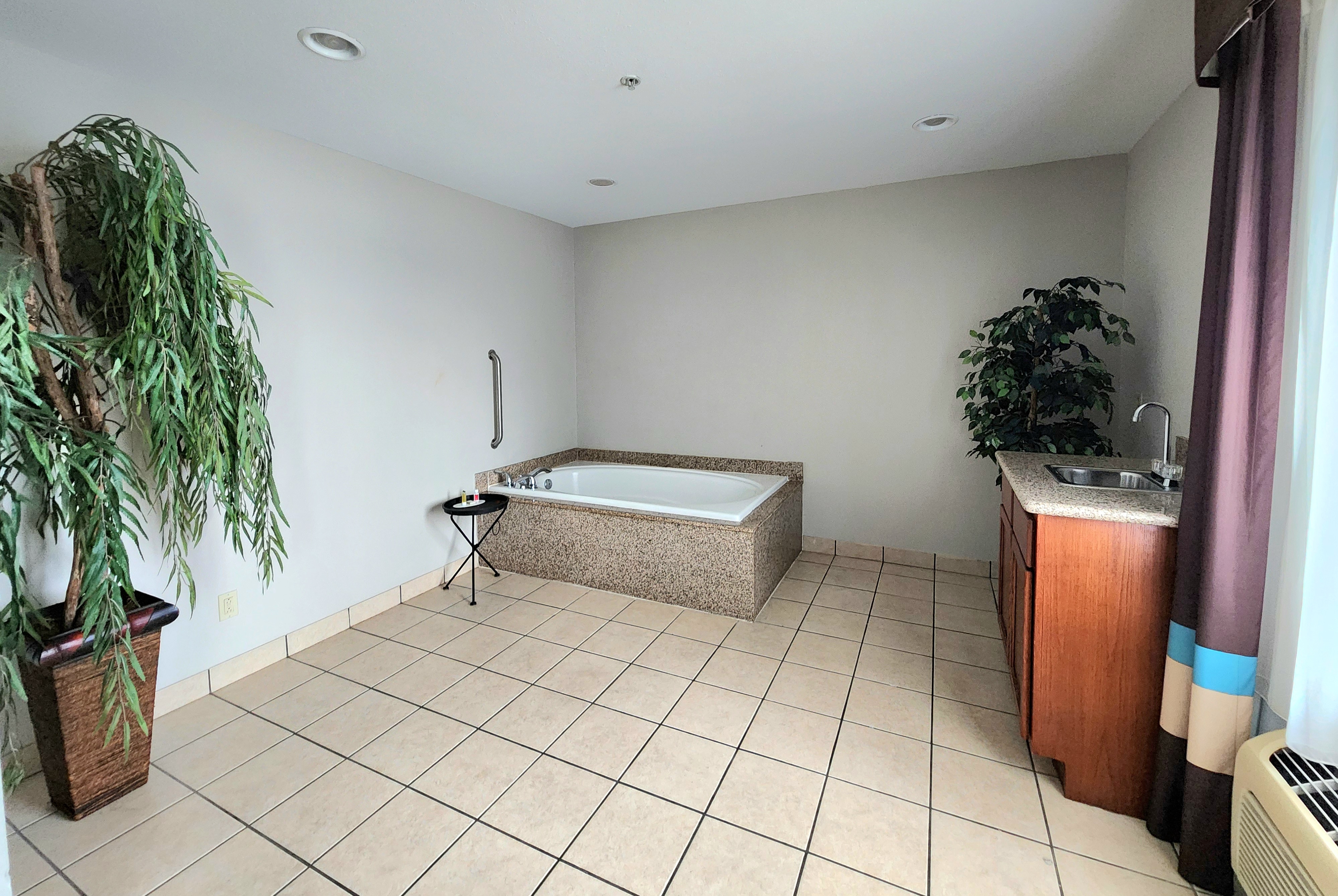 Guest room at the Days Inn & Suites by Wyndham Thibodaux in Thibodaux, Louisiana