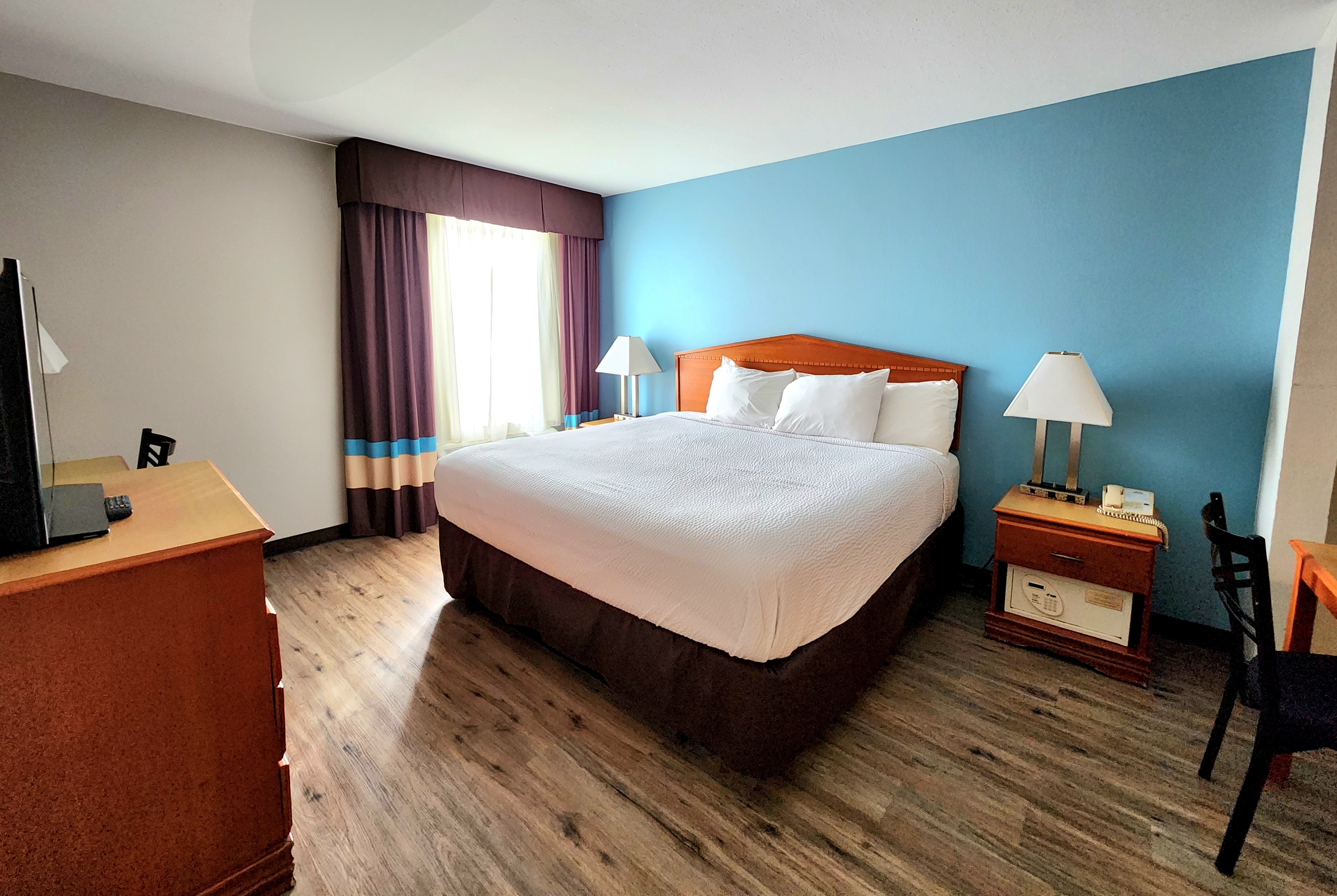 Guest room at the Days Inn & Suites by Wyndham Thibodaux in Thibodaux, Louisiana