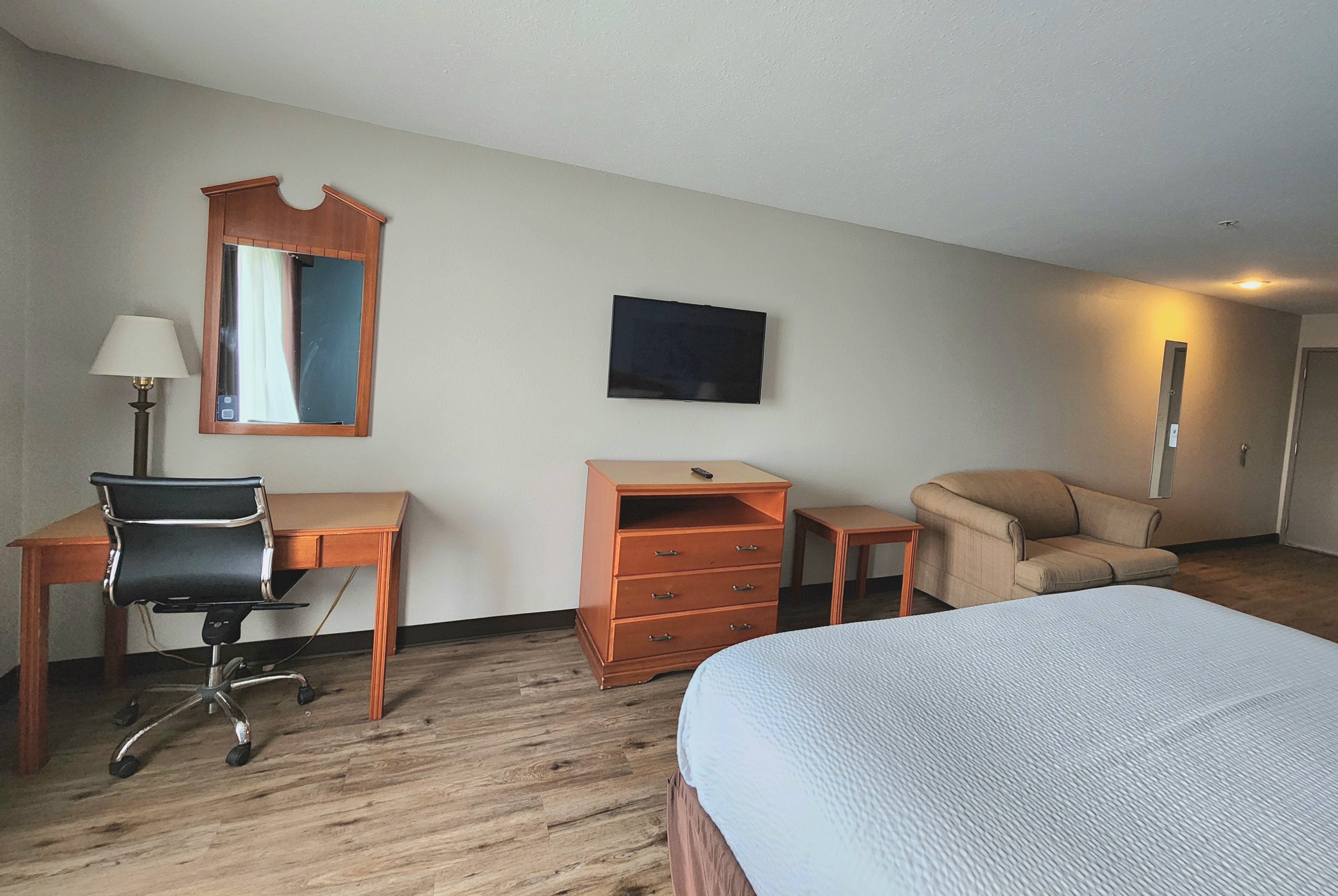 Guest room at the Days Inn & Suites by Wyndham Thibodaux in Thibodaux, Louisiana