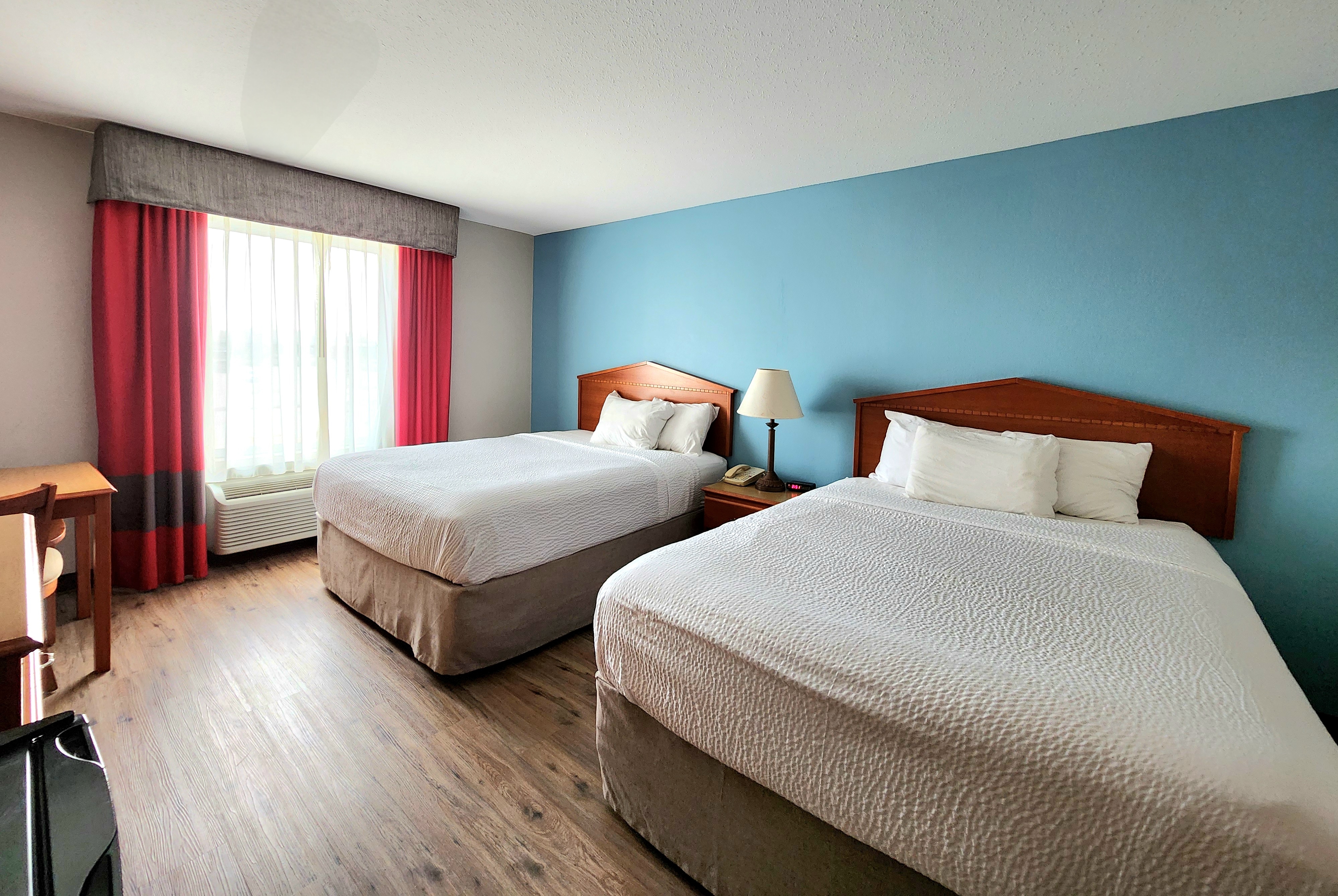 Guest room at the Days Inn & Suites by Wyndham Thibodaux in Thibodaux, Louisiana