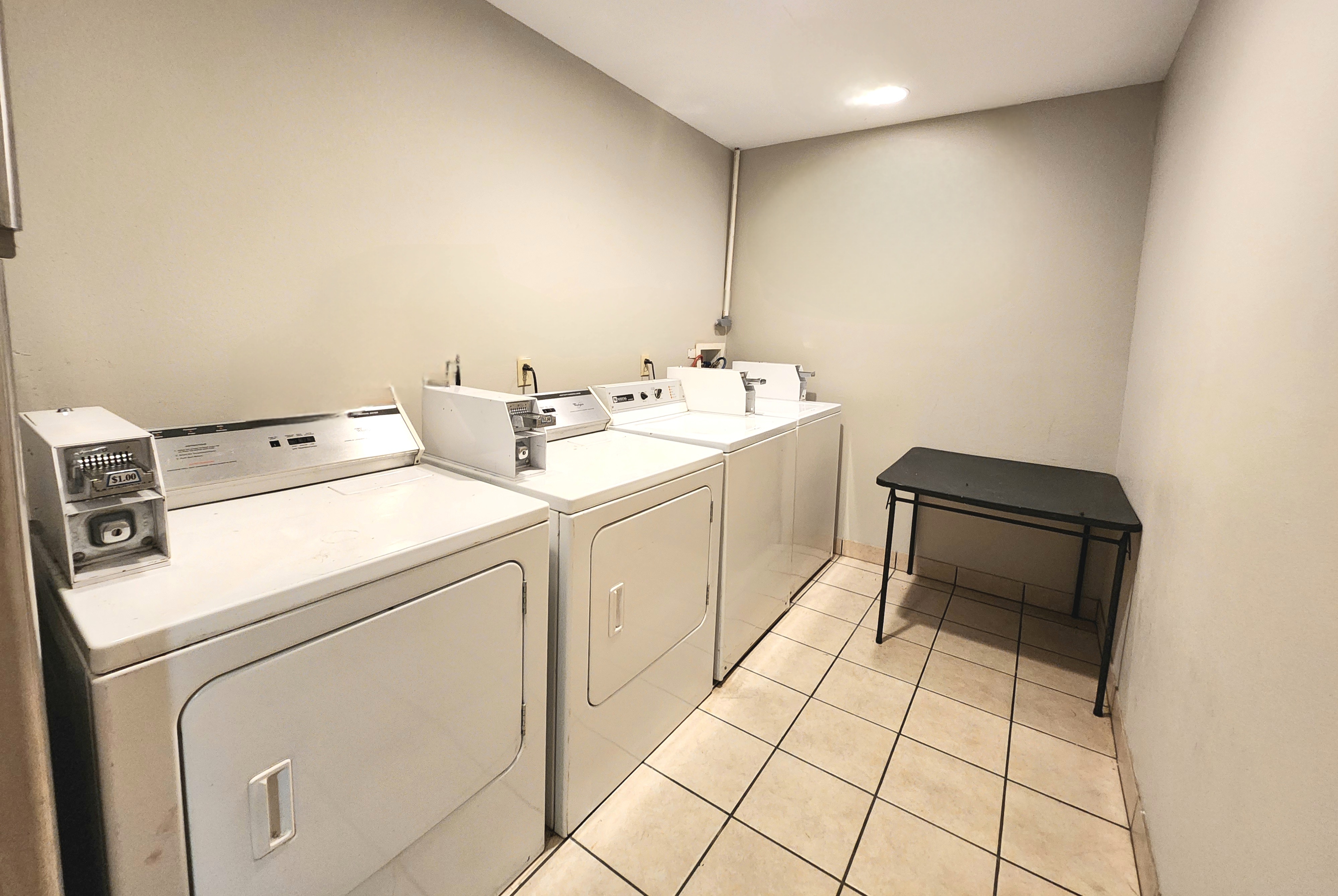 Laundry facilities at Days Inn & Suites by Wyndham Thibodaux in Thibodaux, Louisiana