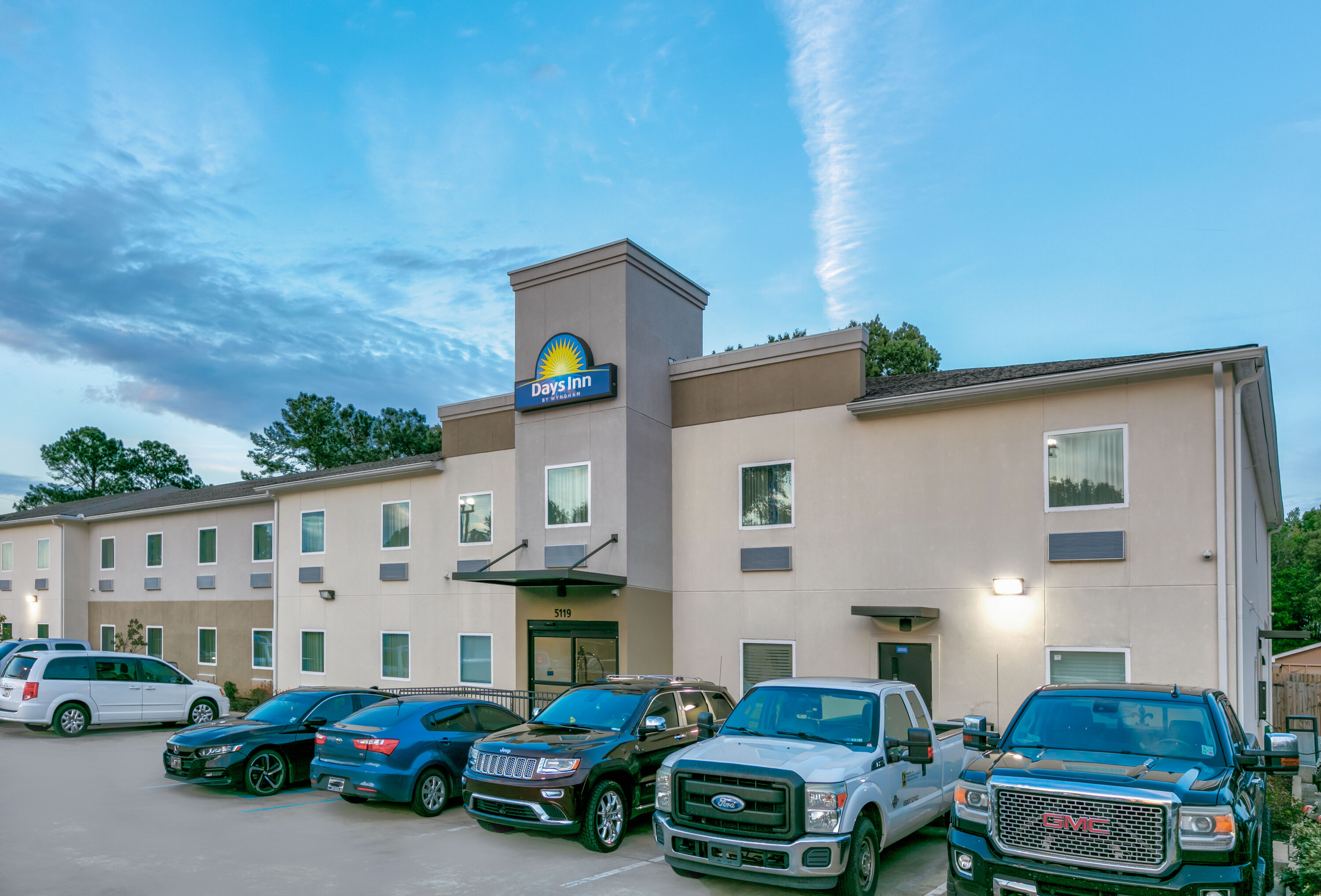 Exterior Dusk Image of Days Inn by Wyndham Zachary LA hotel in Zachary, Louisiana