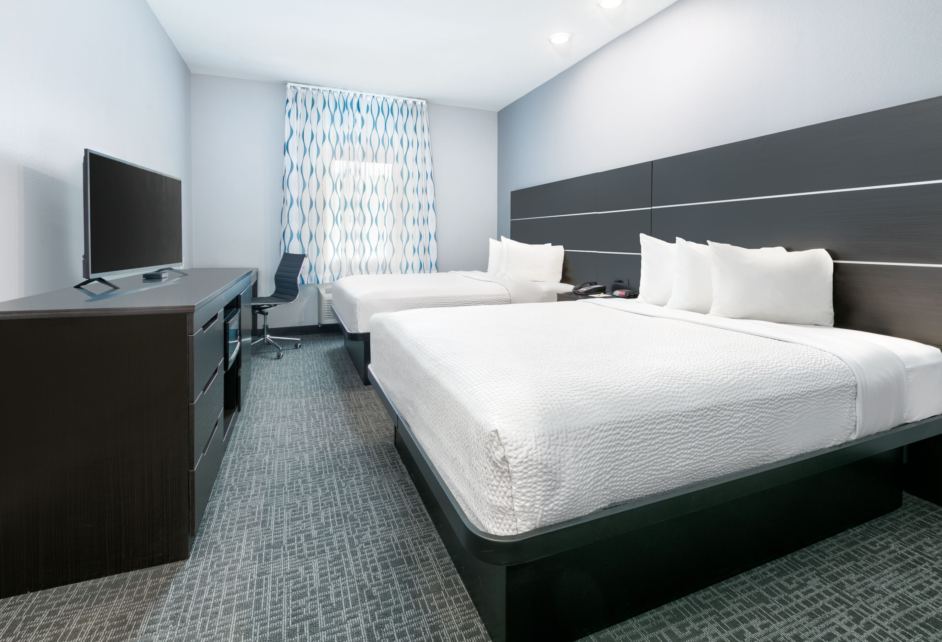 Guest room at the Days Inn by Wyndham Zachary LA in Zachary, Louisiana