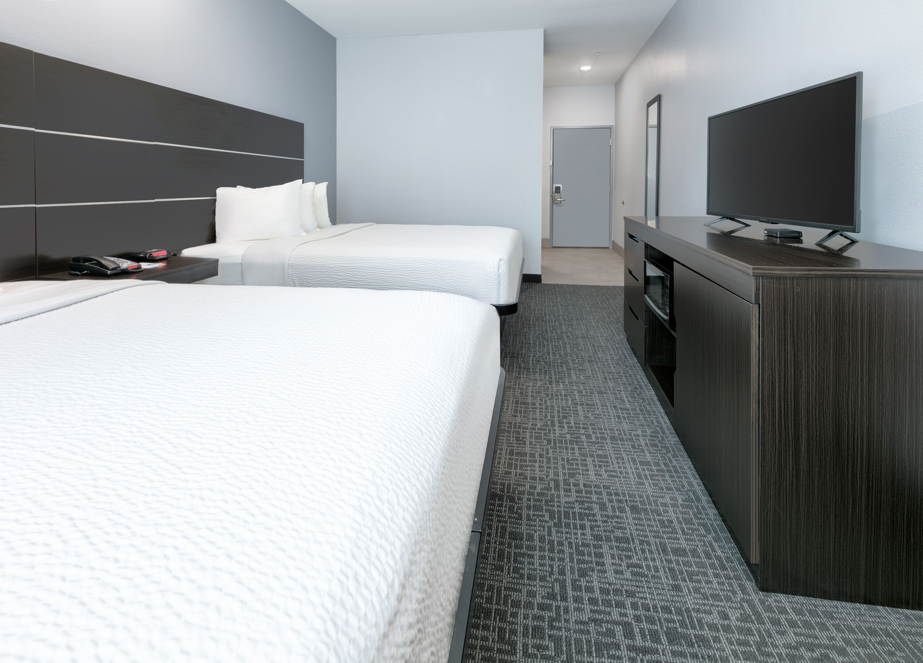 Guest room at the Days Inn by Wyndham Zachary LA in Zachary, Louisiana