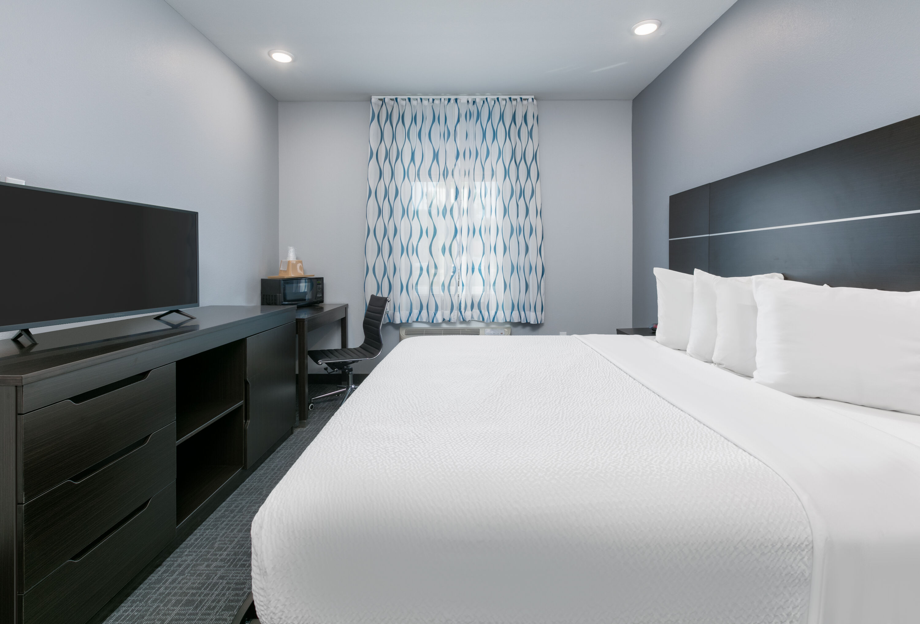 Guest room at the Days Inn by Wyndham Zachary LA in Zachary, Louisiana