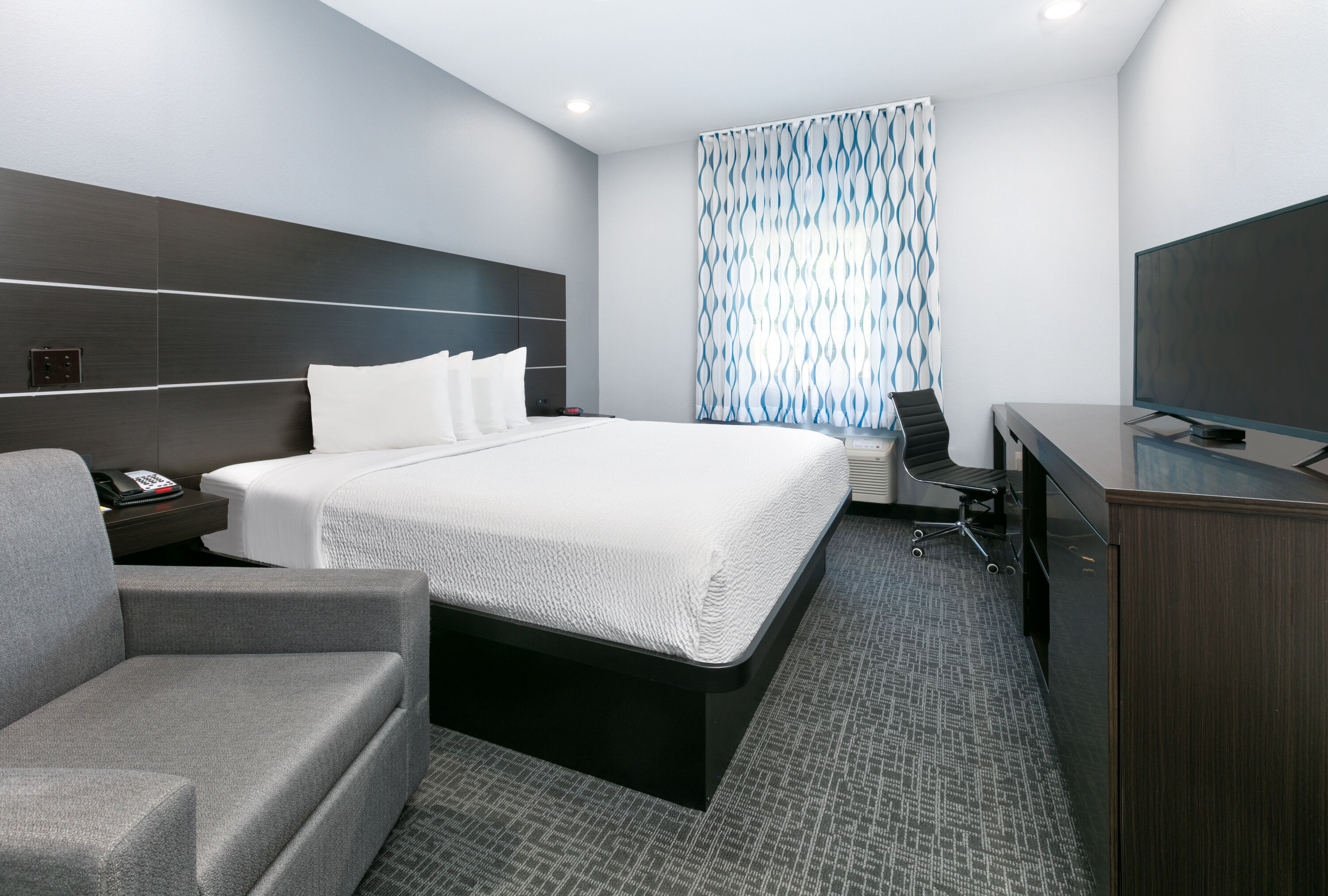 Guest room at the Days Inn by Wyndham Zachary LA in Zachary, Louisiana