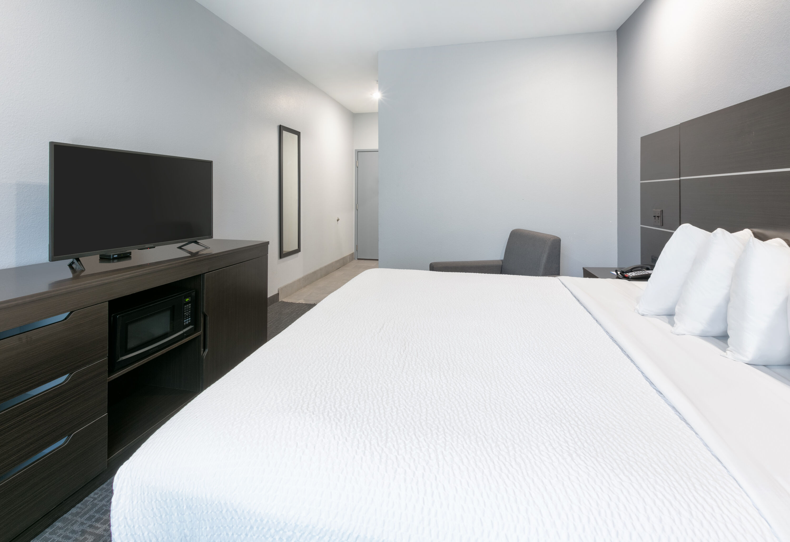 Guest room at the Days Inn by Wyndham Zachary LA in Zachary, Louisiana