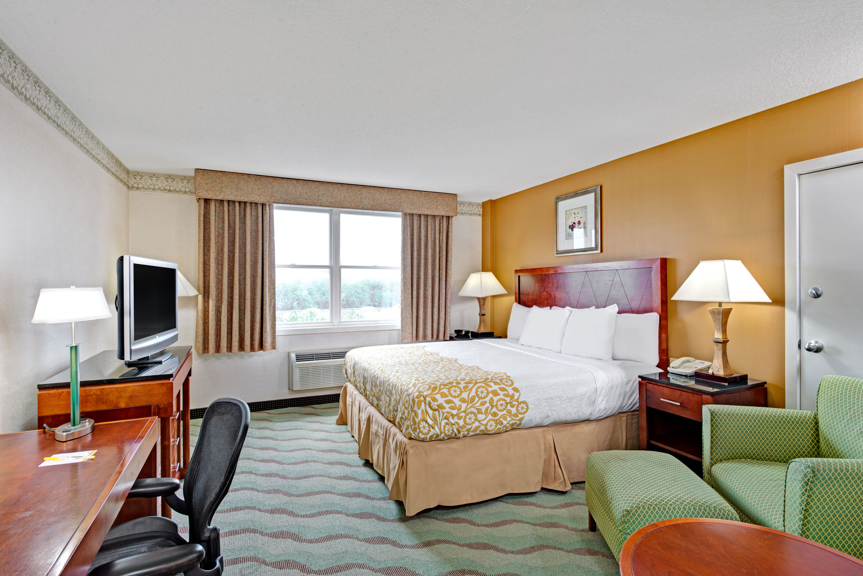 Guest room at the Days Hotel by Wyndham Methuen MA Conference Center in Methuen, Massachusetts