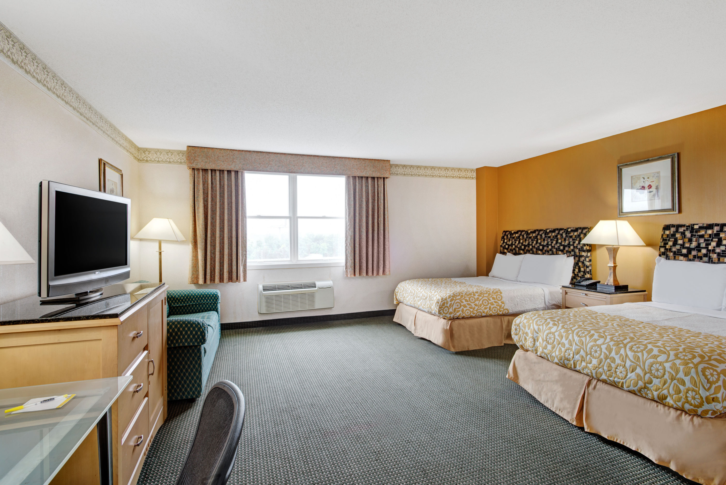 Guest room at the Days Hotel by Wyndham Methuen MA Conference Center in Methuen, Massachusetts