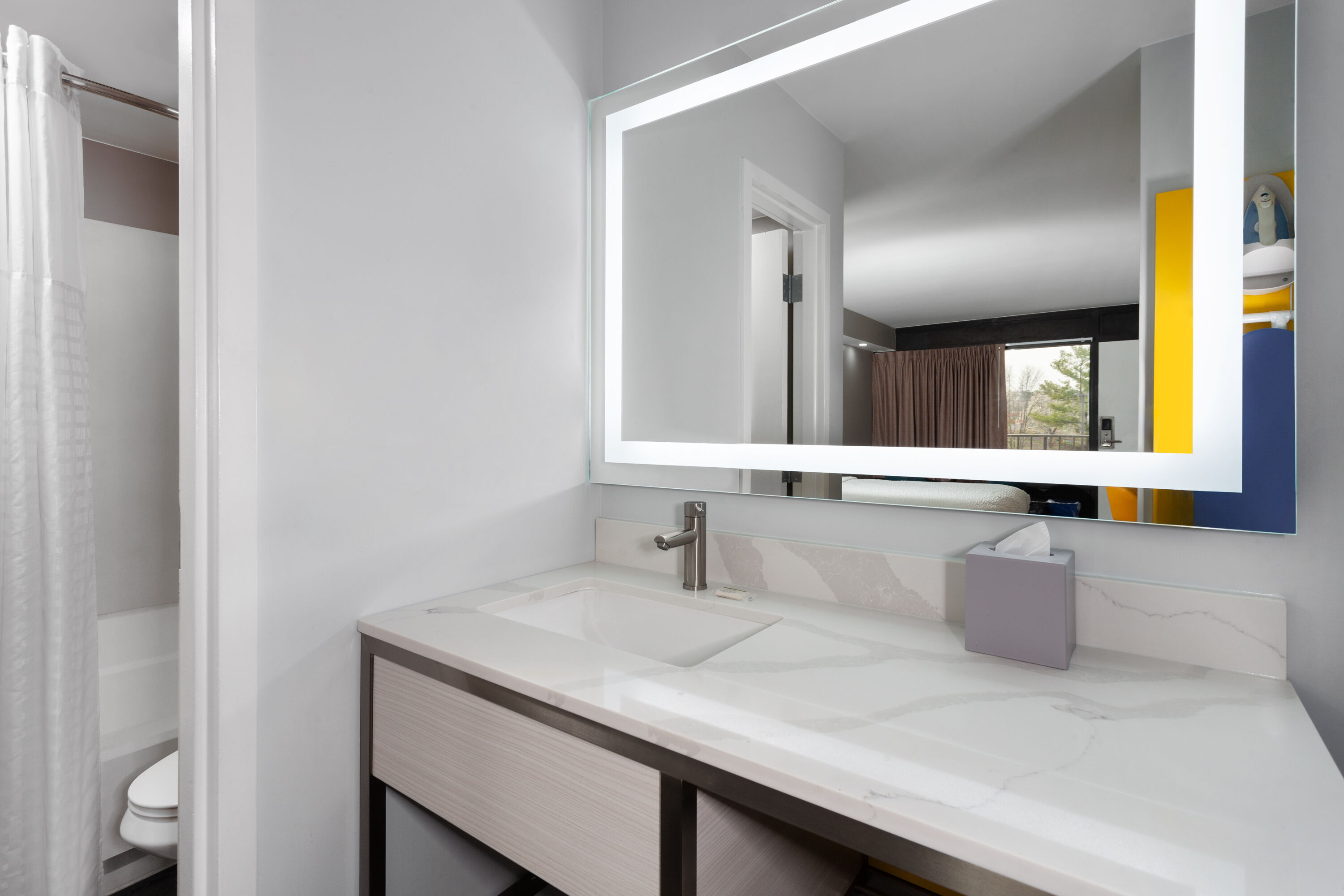 Guest room bath at the Days Inn by Wyndham Baltimore Northwest in Baltimore, Maryland