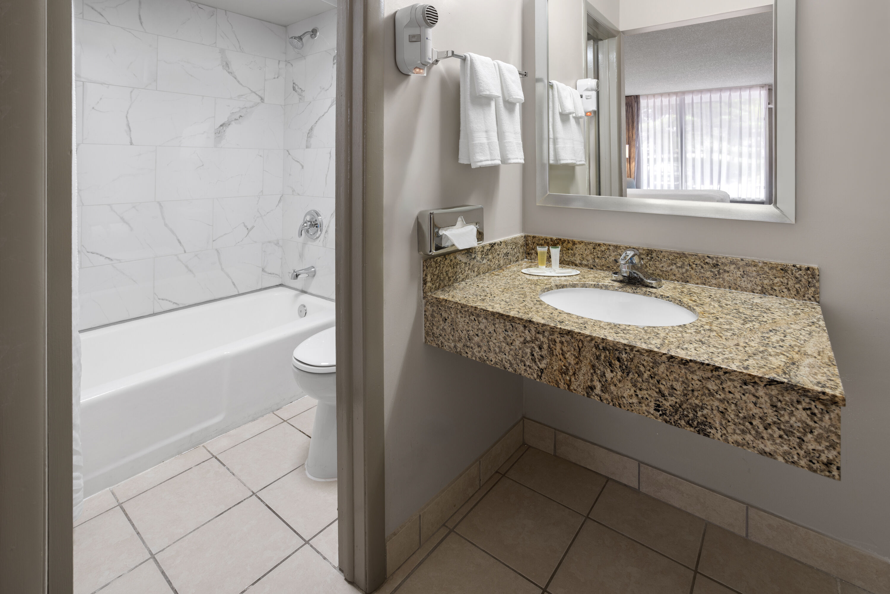 Guest room bath at the Days Inn by Wyndham Frederick in Frederick, Maryland