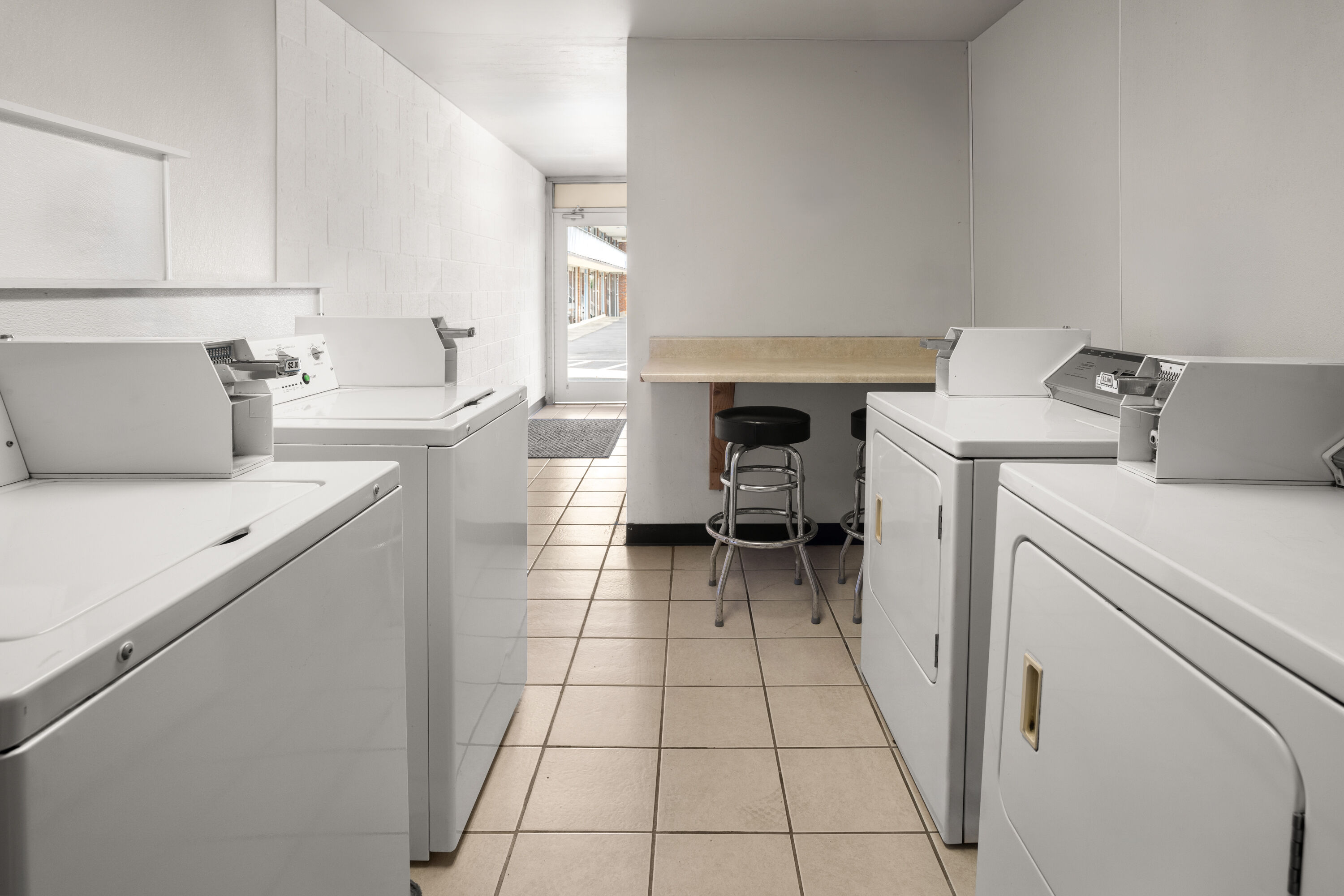 Laundry facilities at Days Inn by Wyndham Frederick in Frederick, Maryland